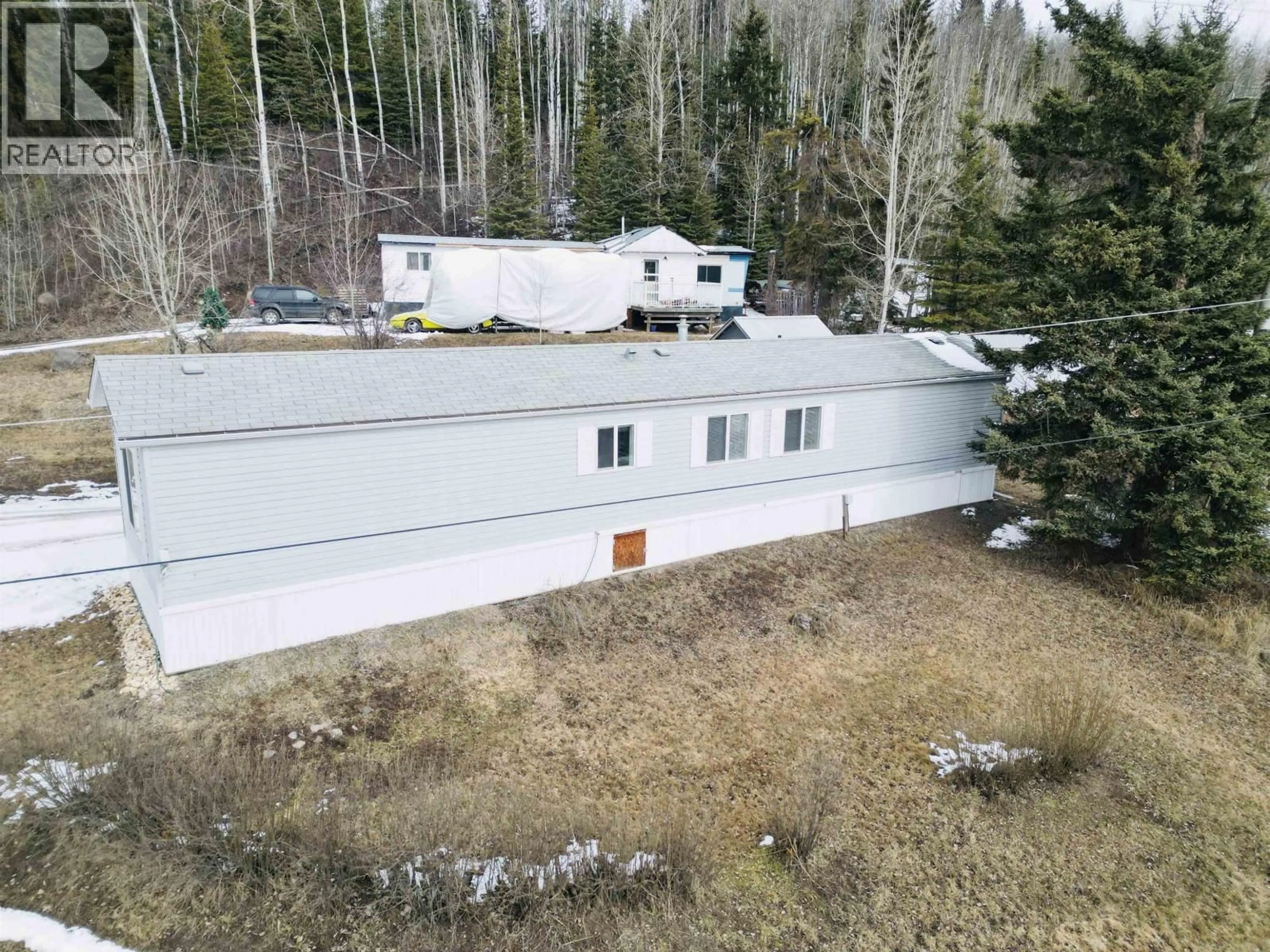 A pic from outside/outdoor area/front of a property/back of a property/a pic from drone, unknown for B13 - 160 16 HIGHWAY, Burns Lake British Columbia V0J1E0
