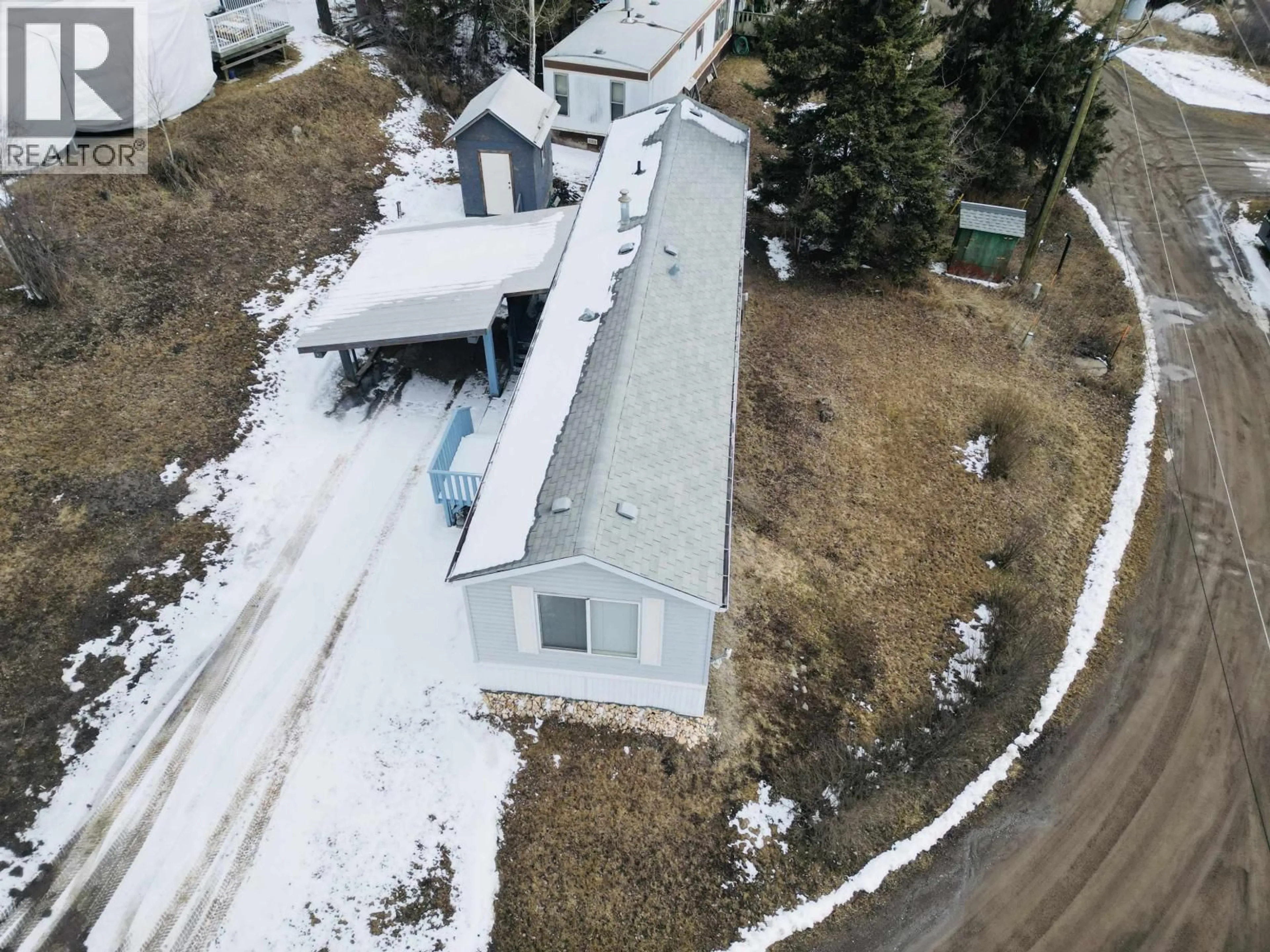 A pic from outside/outdoor area/front of a property/back of a property/a pic from drone, building for B13 - 160 16 HIGHWAY, Burns Lake British Columbia V0J1E0