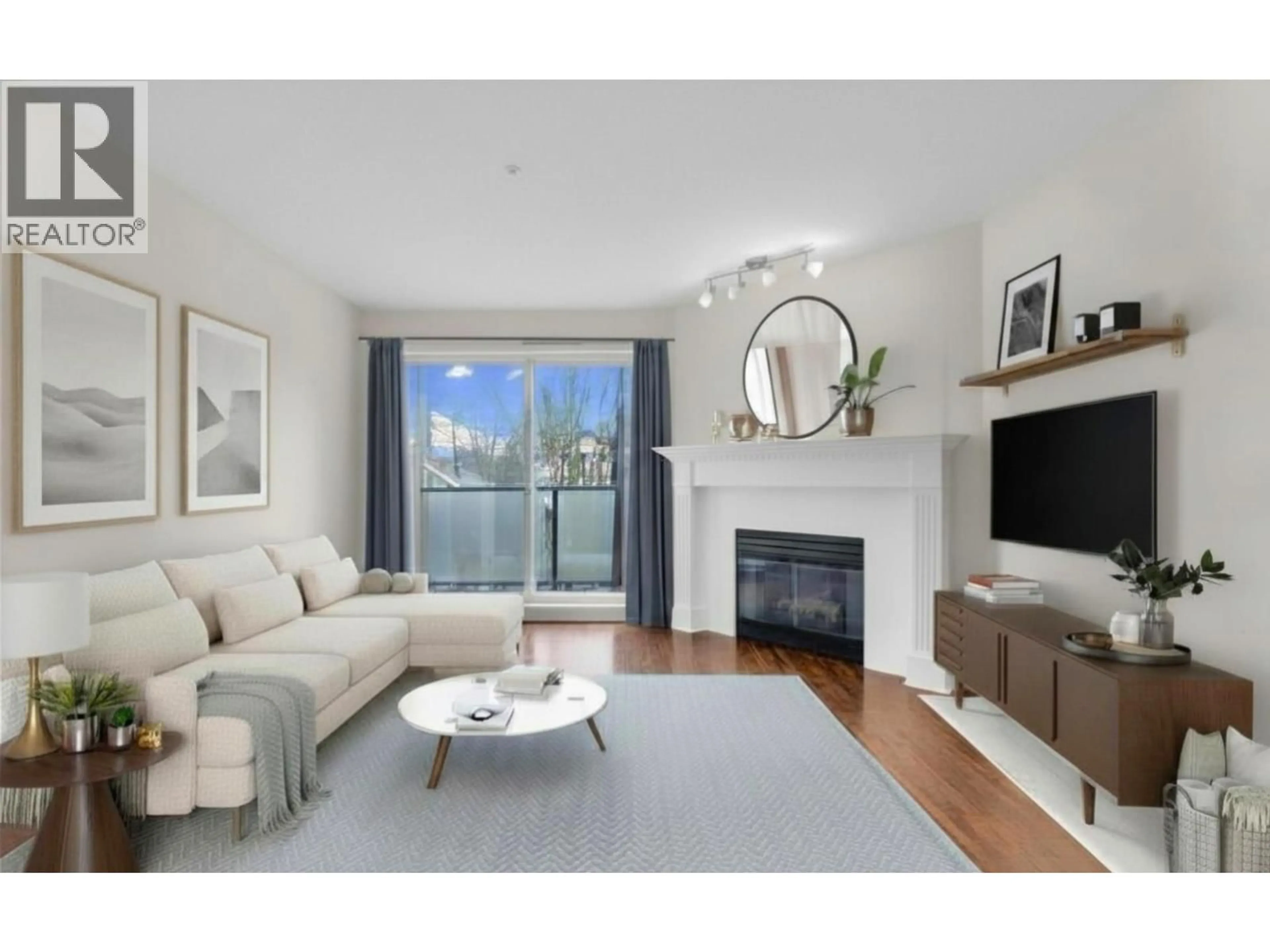 Living room with furniture, wood/laminate floor for 307 - 876 16TH AVENUE, Vancouver British Columbia V5Z1T1