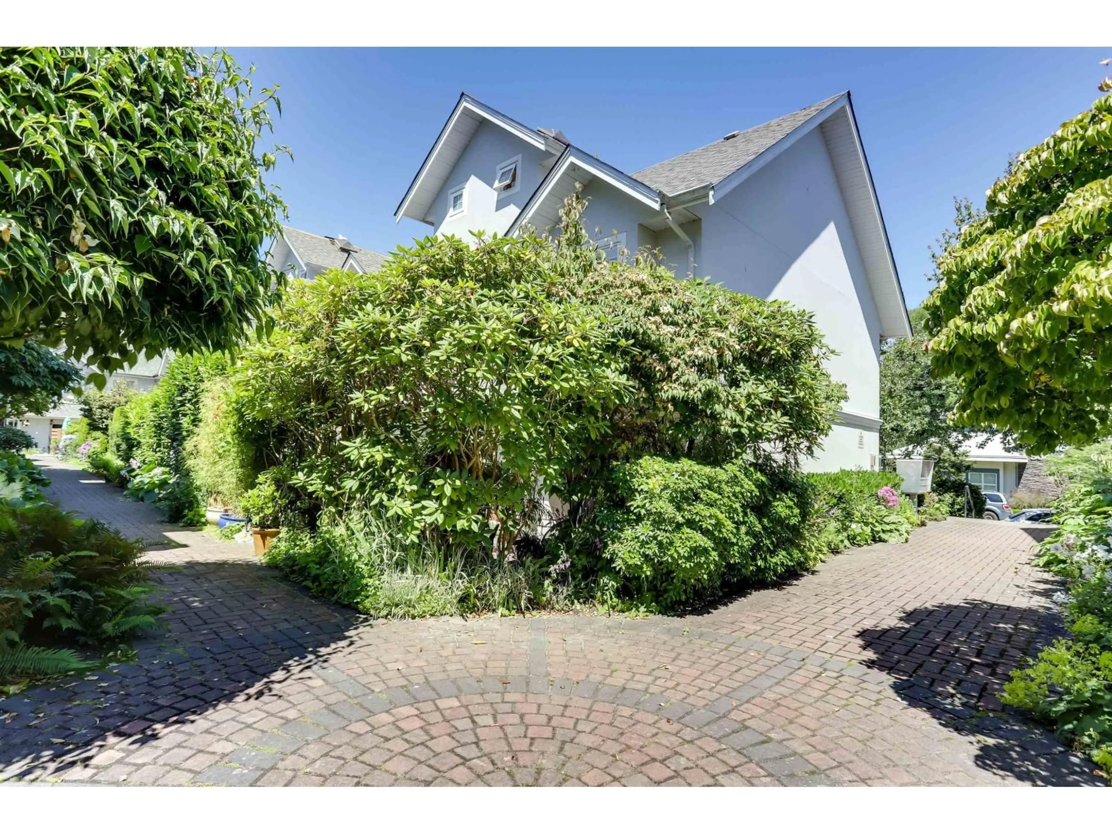 A pic from outside/outdoor area/front of a property/back of a property/a pic from drone, street for 1 - 15432 16A AVENUE, Surrey British Columbia V4A1T3