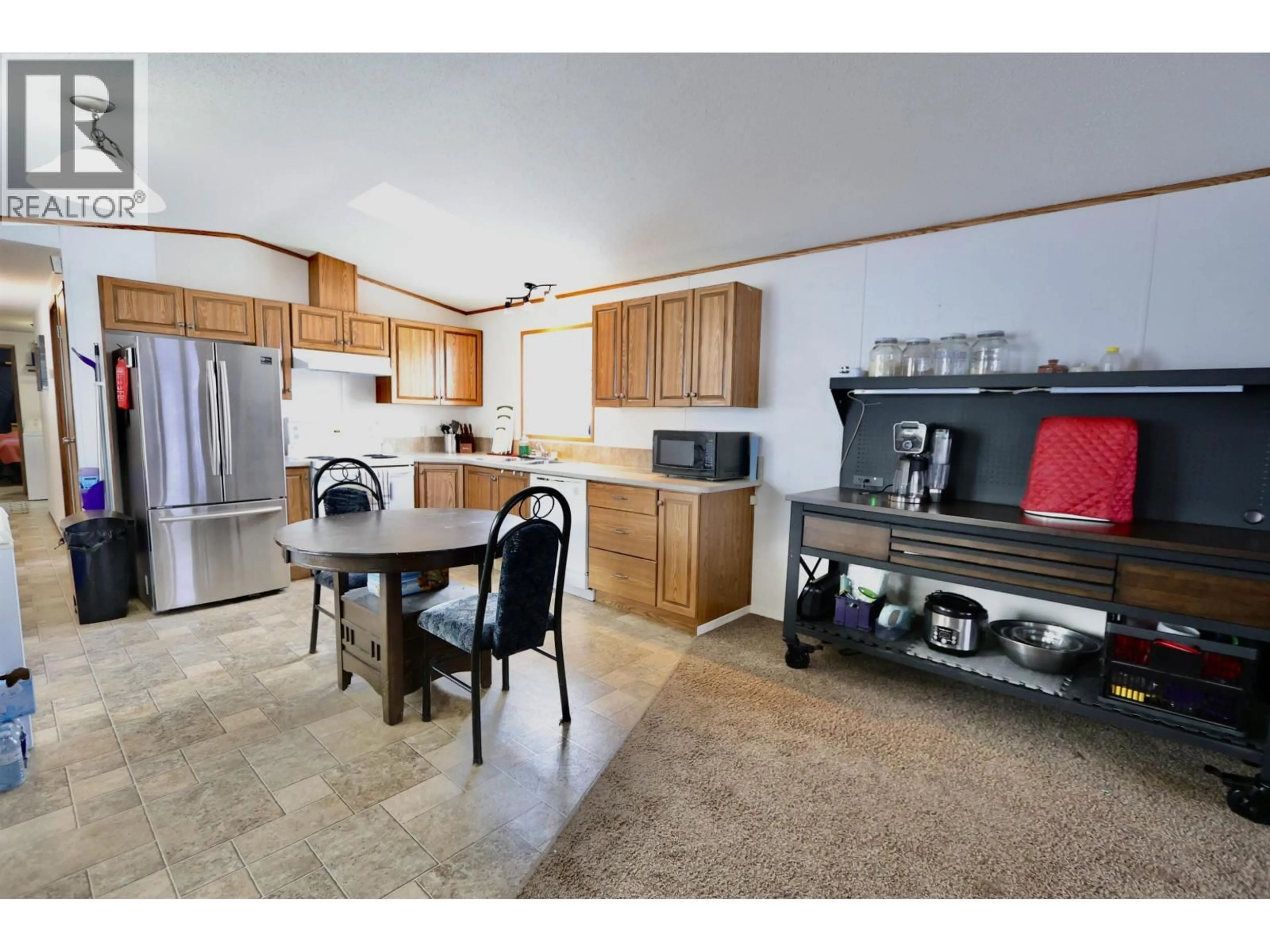 Open concept kitchen, ceramic/tile floor for 45 - 5125 NORTH NECHAKO ROAD, Prince George British Columbia V2K4V7