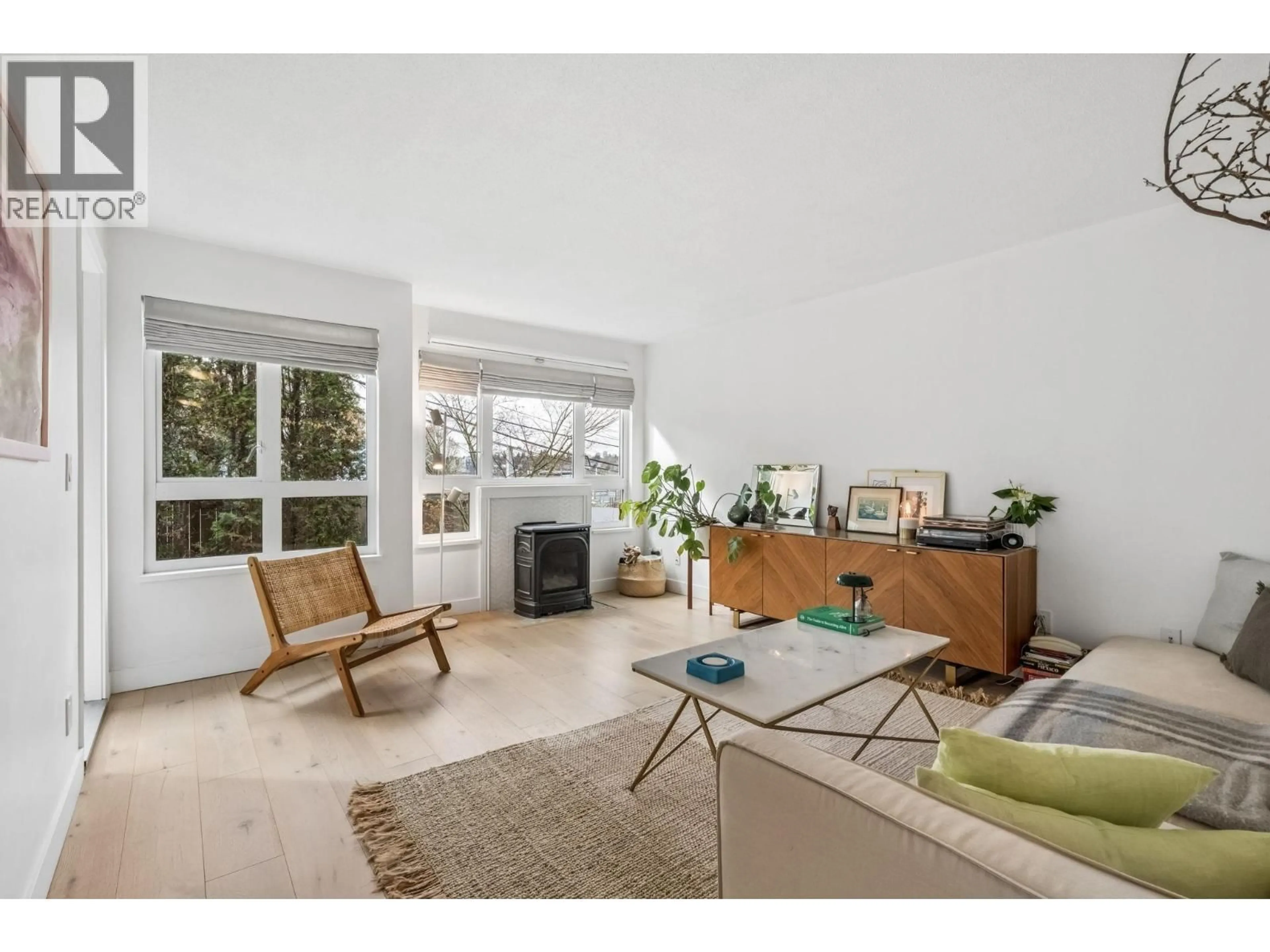 Living room with furniture, unknown for 205 - 1330 GRAVELEY STREET, Vancouver British Columbia V5L3A2