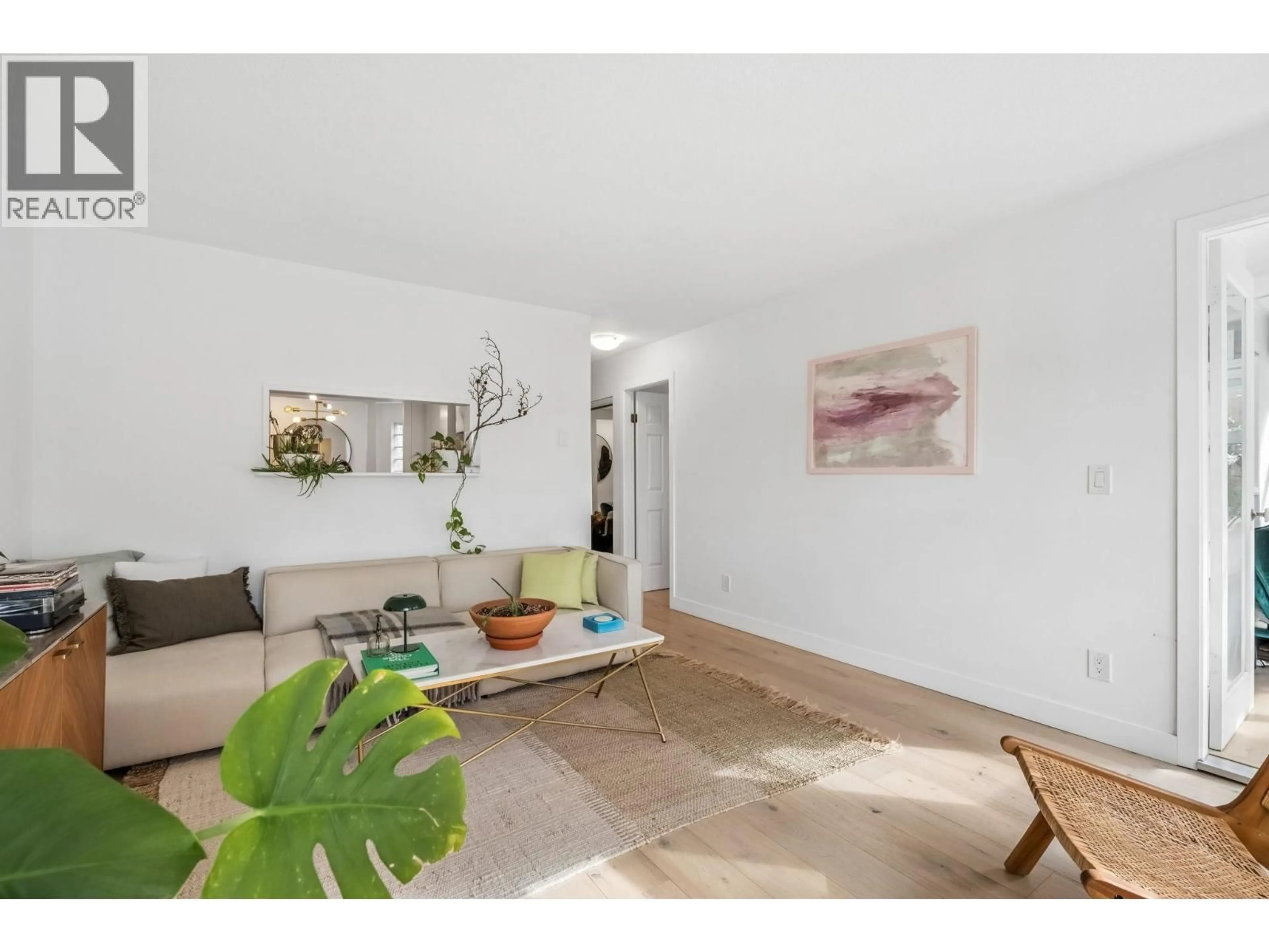 Living room with furniture, unknown for 205 - 1330 GRAVELEY STREET, Vancouver British Columbia V5L3A2