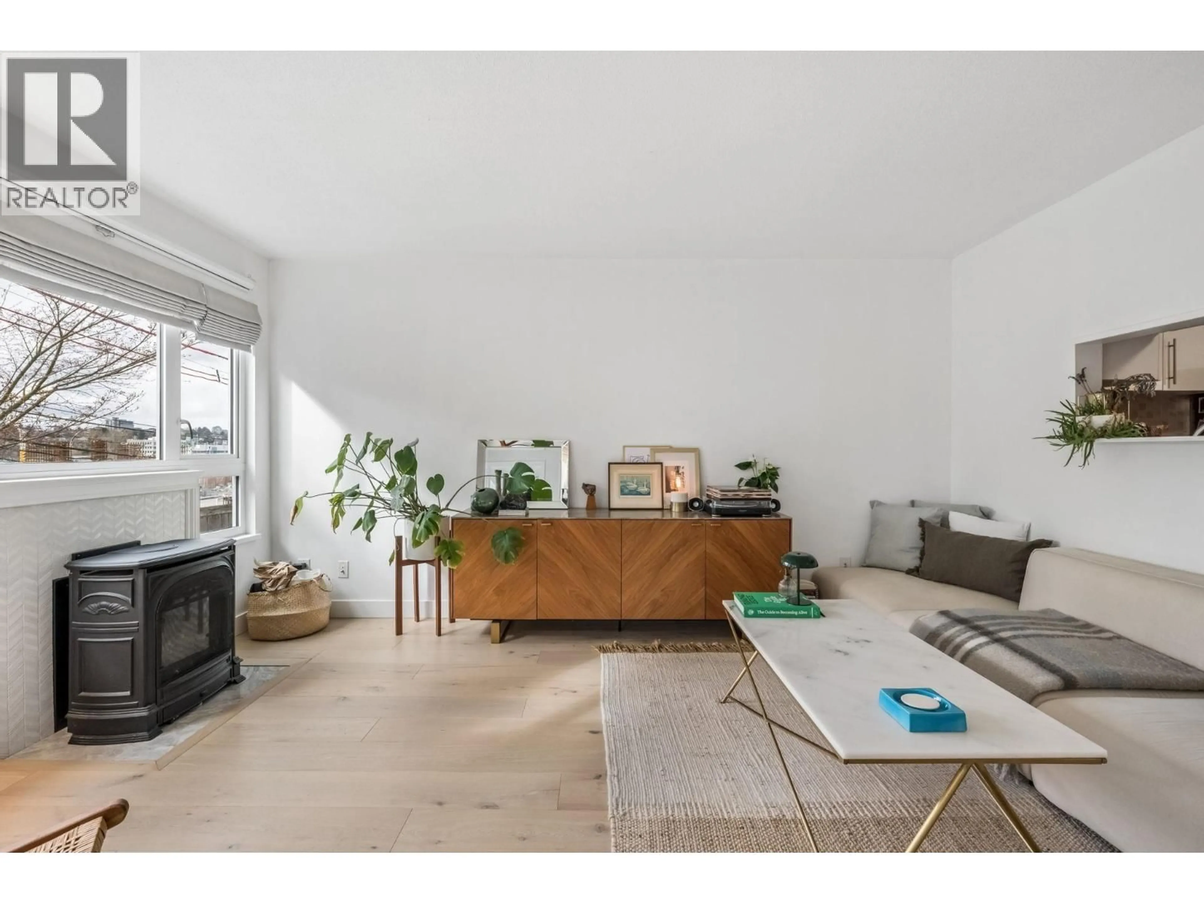 Living room with furniture, unknown for 205 - 1330 GRAVELEY STREET, Vancouver British Columbia V5L3A2