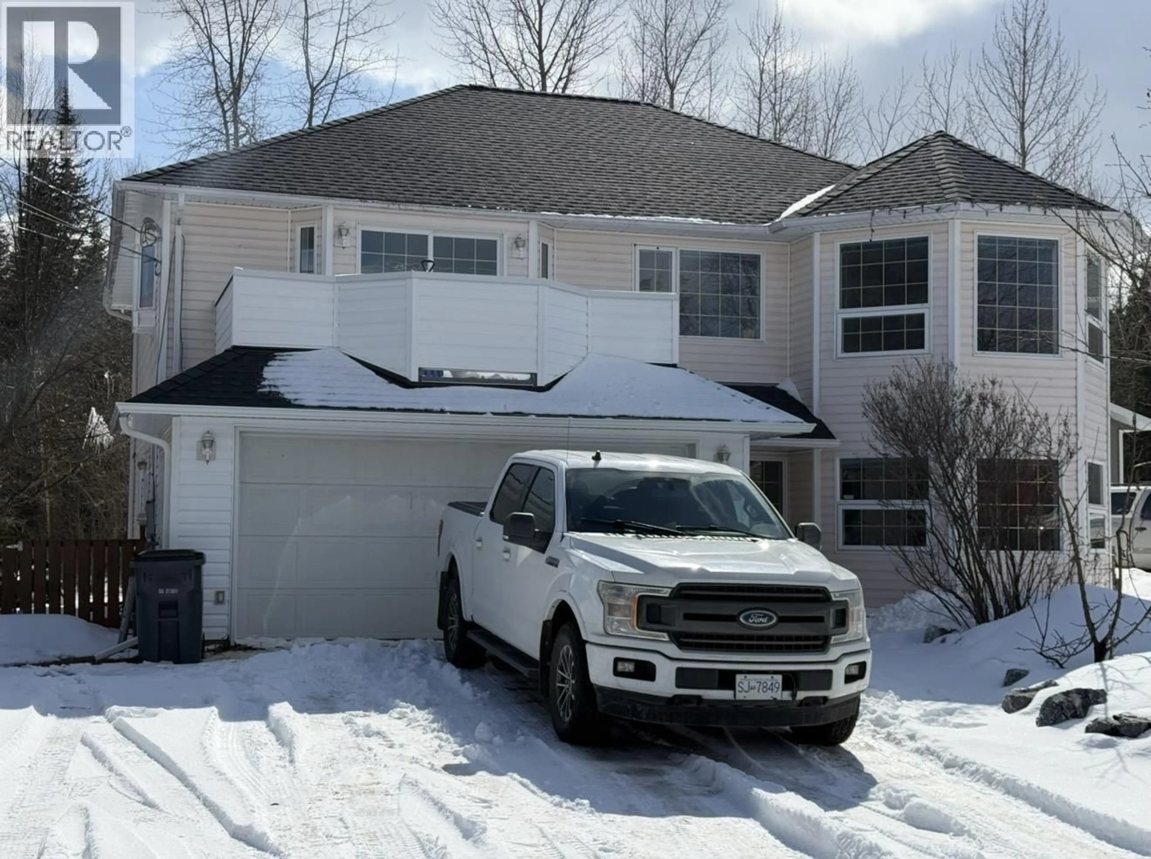 Home with vinyl exterior material, street for 4629 ZRAL ROAD, Prince George British Columbia V2K5X9