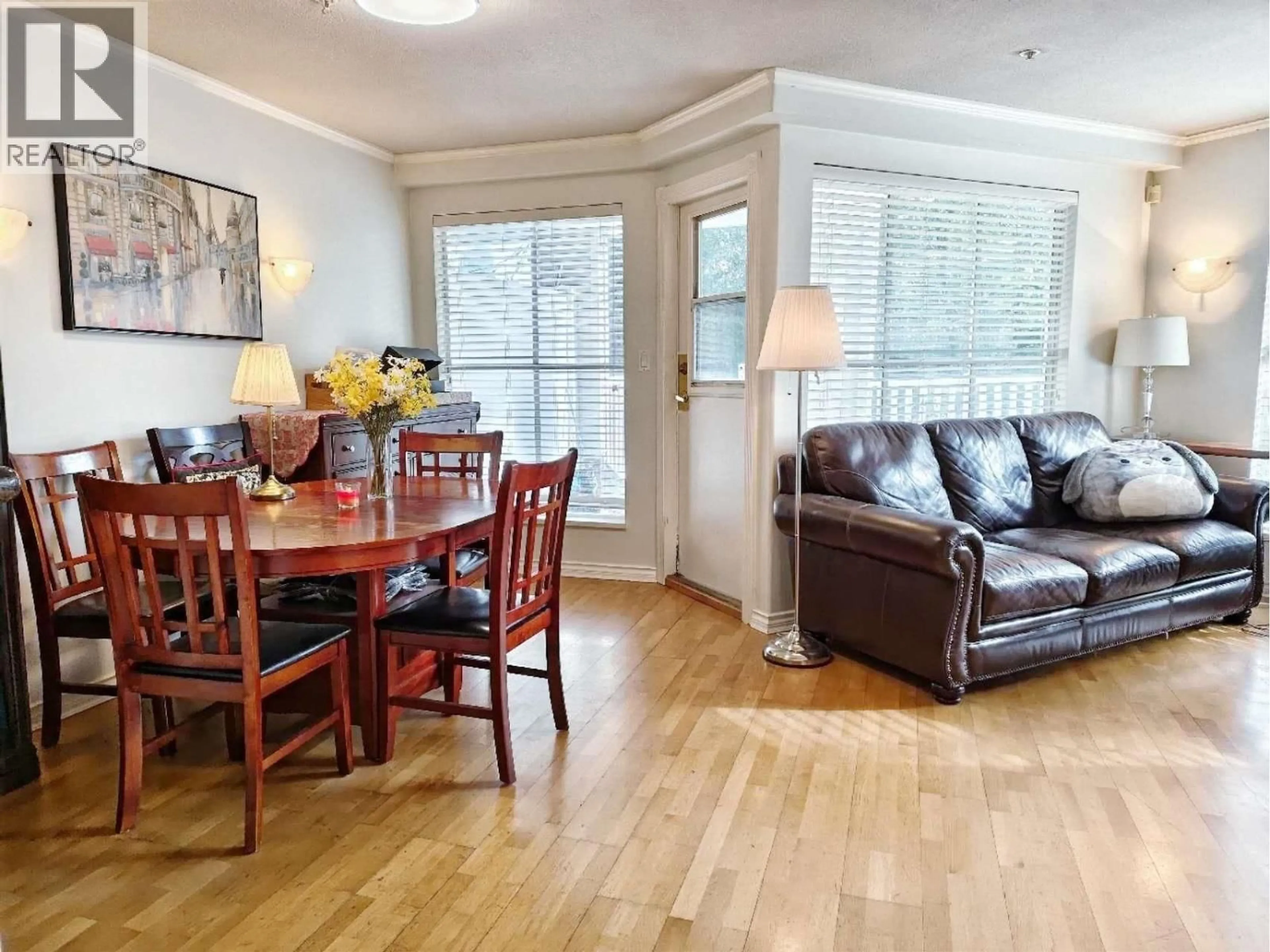 Living room with furniture, wood/laminate floor for 128 - 8880 JONES ROAD, Richmond British Columbia V6Y3Z1