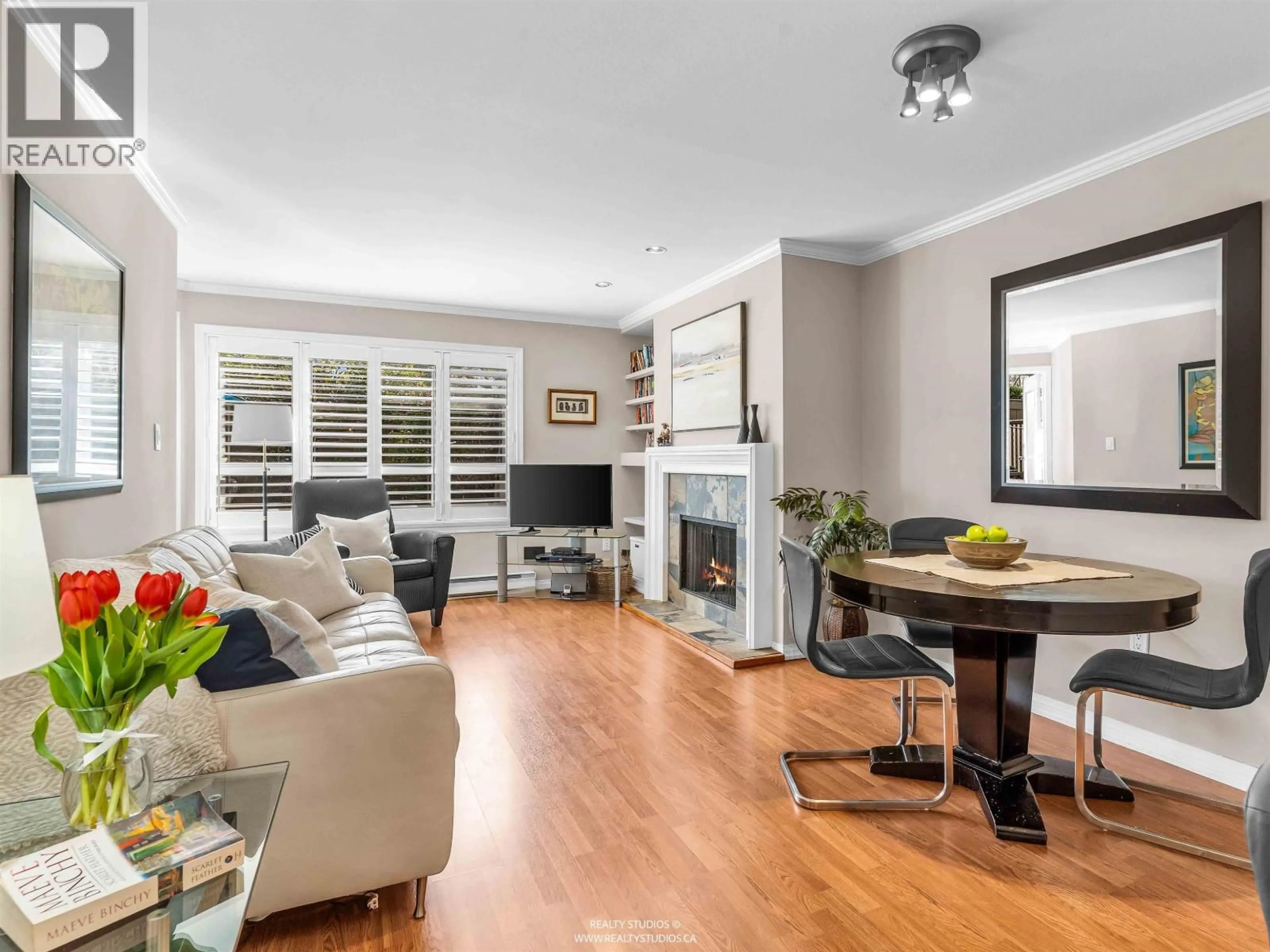 Living room with furniture, wood/laminate floor for 109 - 555 14TH AVENUE, Vancouver British Columbia V5Z4G8