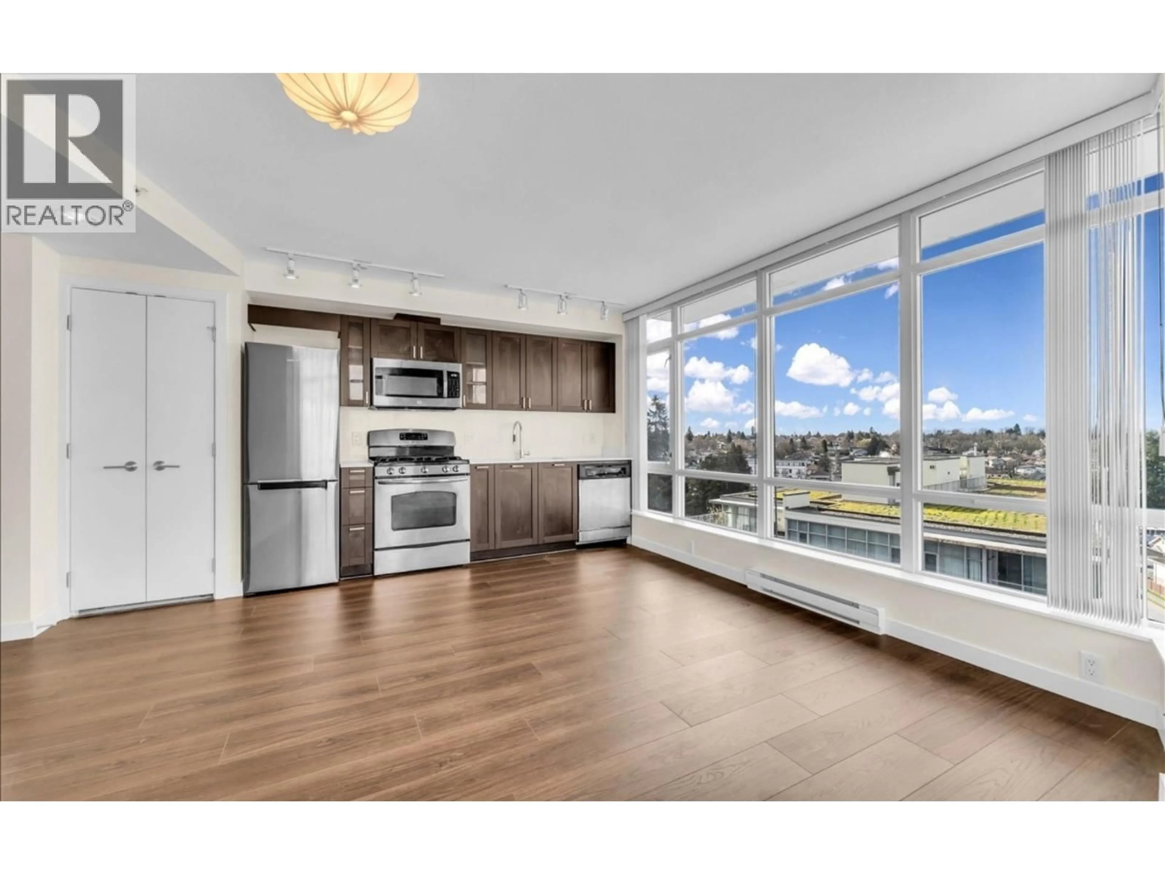 Open concept kitchen, wood/laminate floor for 1009 - 4815 ELDORADO MEWS, Vancouver British Columbia V5R0B2