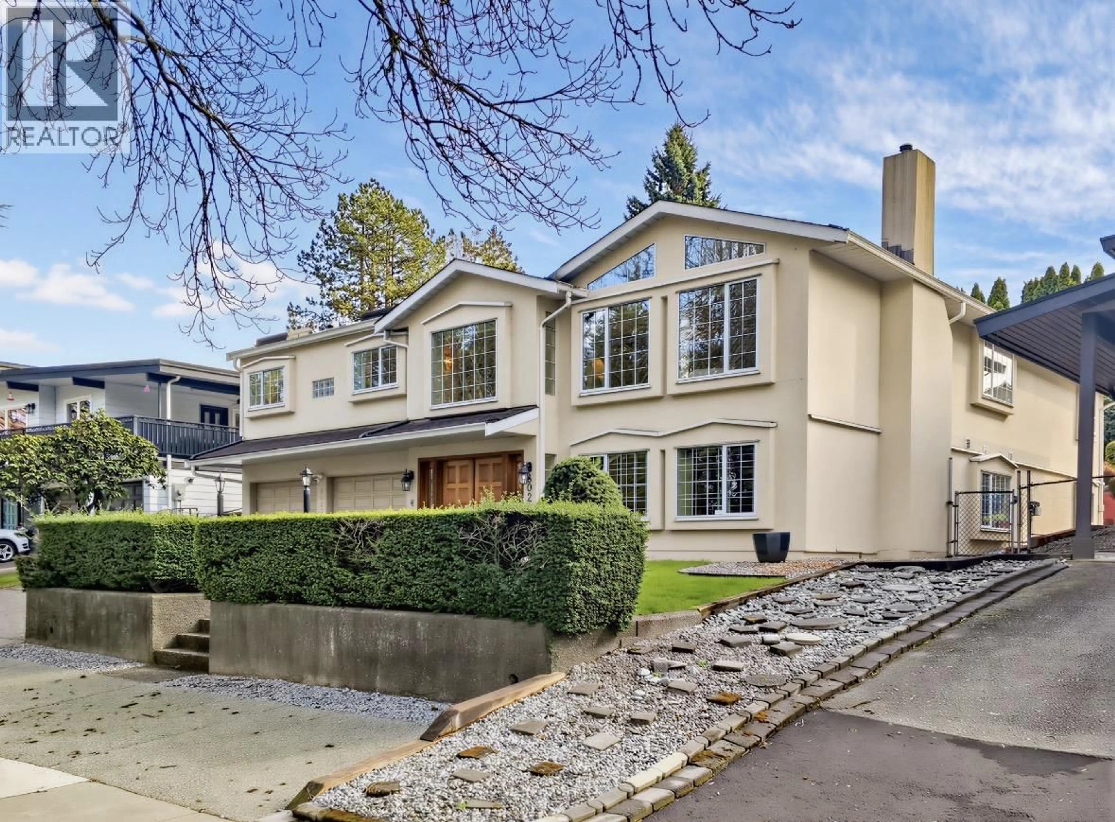 Home with vinyl exterior material, street for 8022 LAKEFIELD DRIVE, Burnaby British Columbia V5E3W8