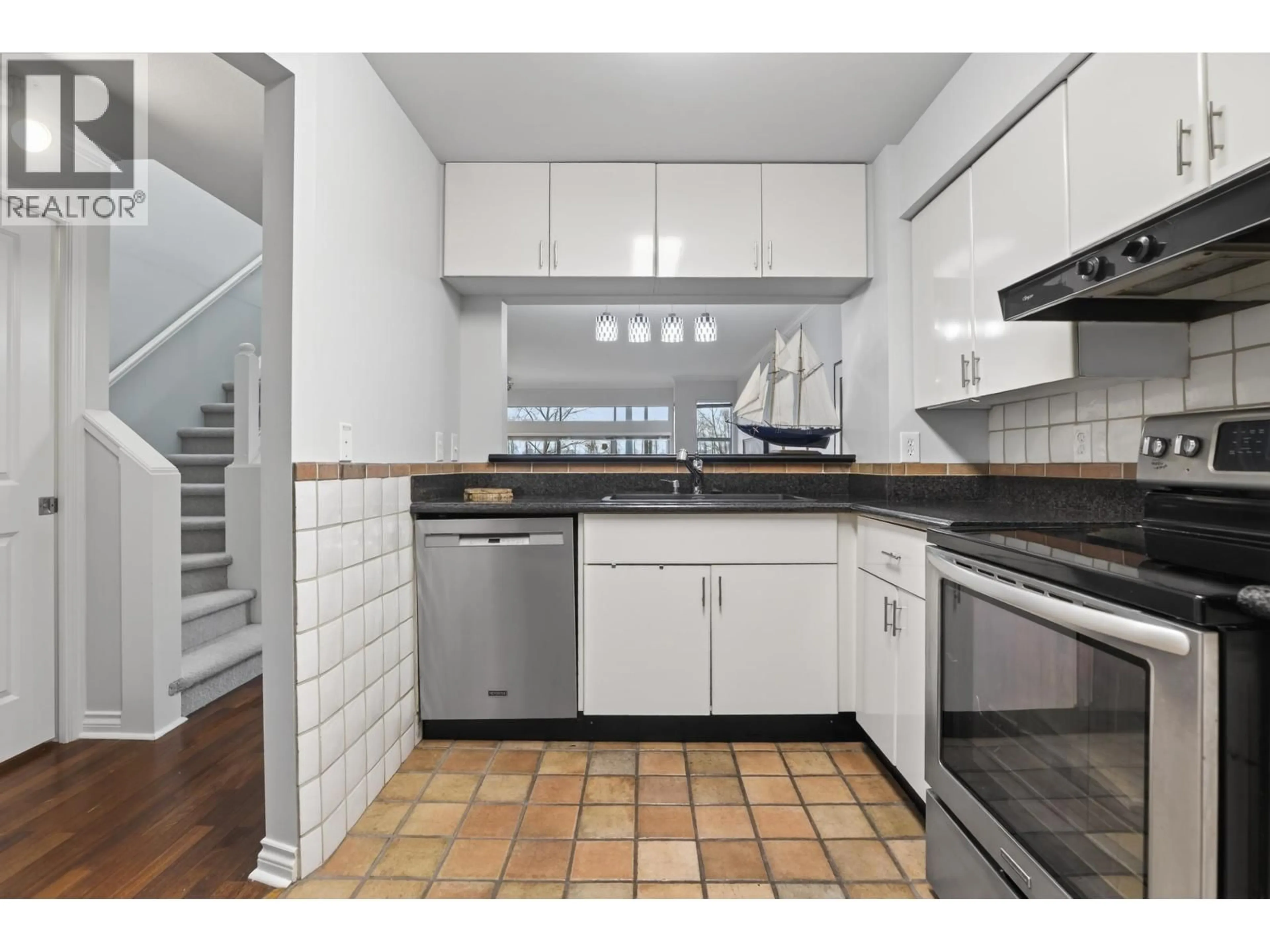 Standard kitchen, ceramic/tile floor for 8489 NANAIMO STREET, Vancouver British Columbia V5P4V8