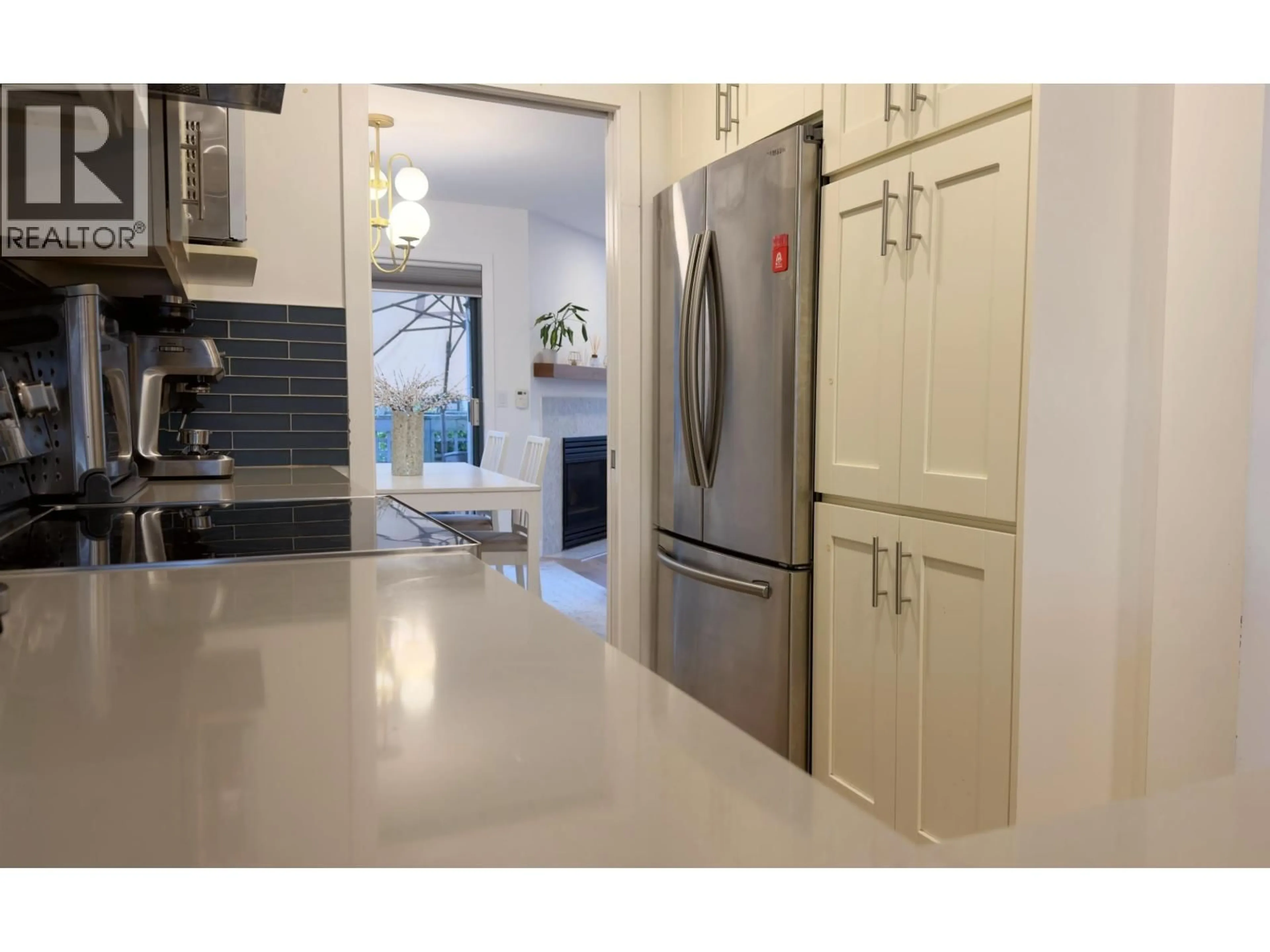 Open concept kitchen, ceramic/tile floor for 10 - 2118 EASTERN AVENUE, North Vancouver British Columbia V7L3G3