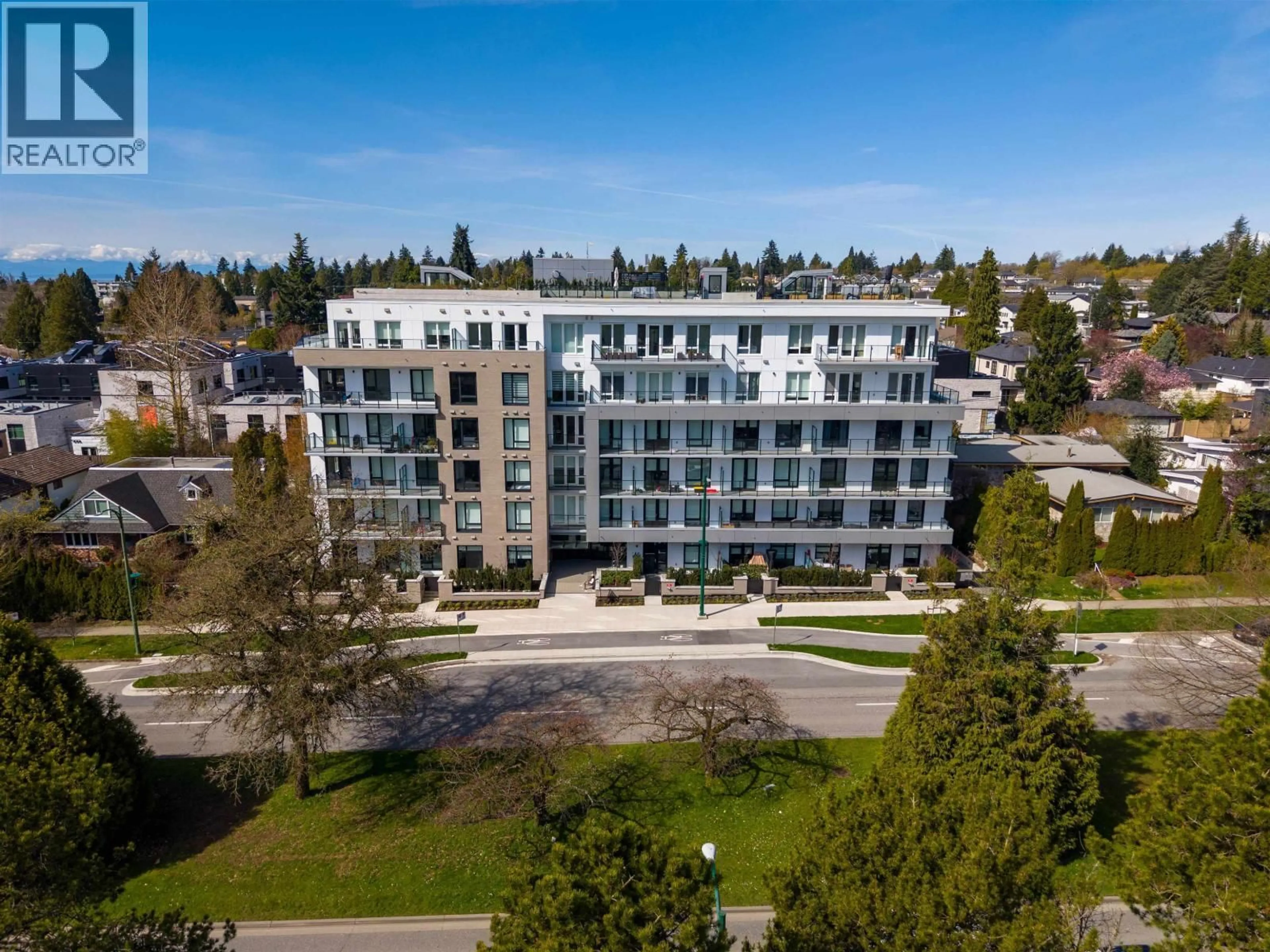 A pic from outside/outdoor area/front of a property/back of a property/a pic from drone, unknown for 105 - 6859 CAMBIE STREET, Vancouver British Columbia V6P3H1