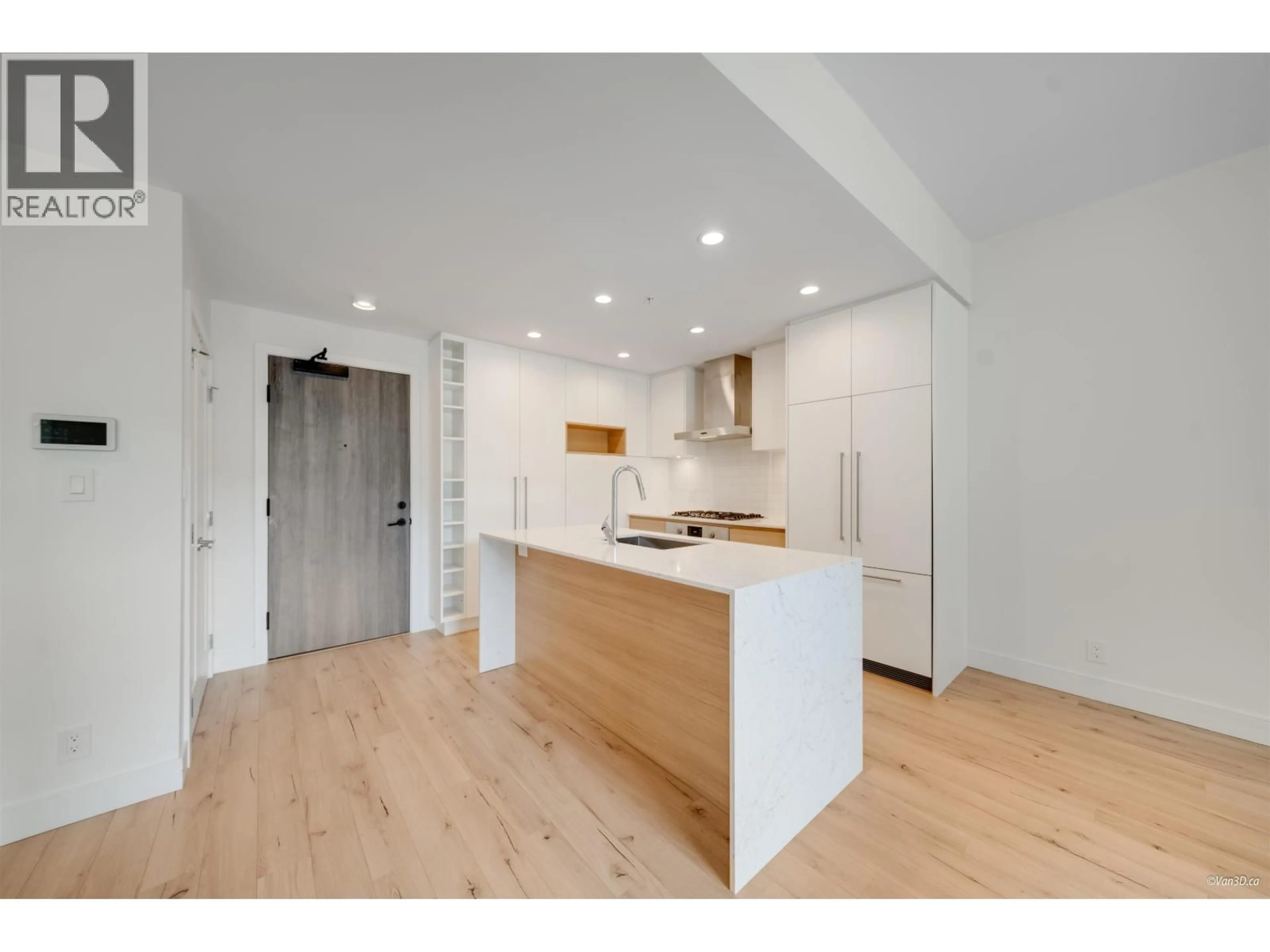 Open concept kitchen, wood/laminate floor for 201 - 55 KLAHANIE DRIVE, Port Moody British Columbia V3H0M9