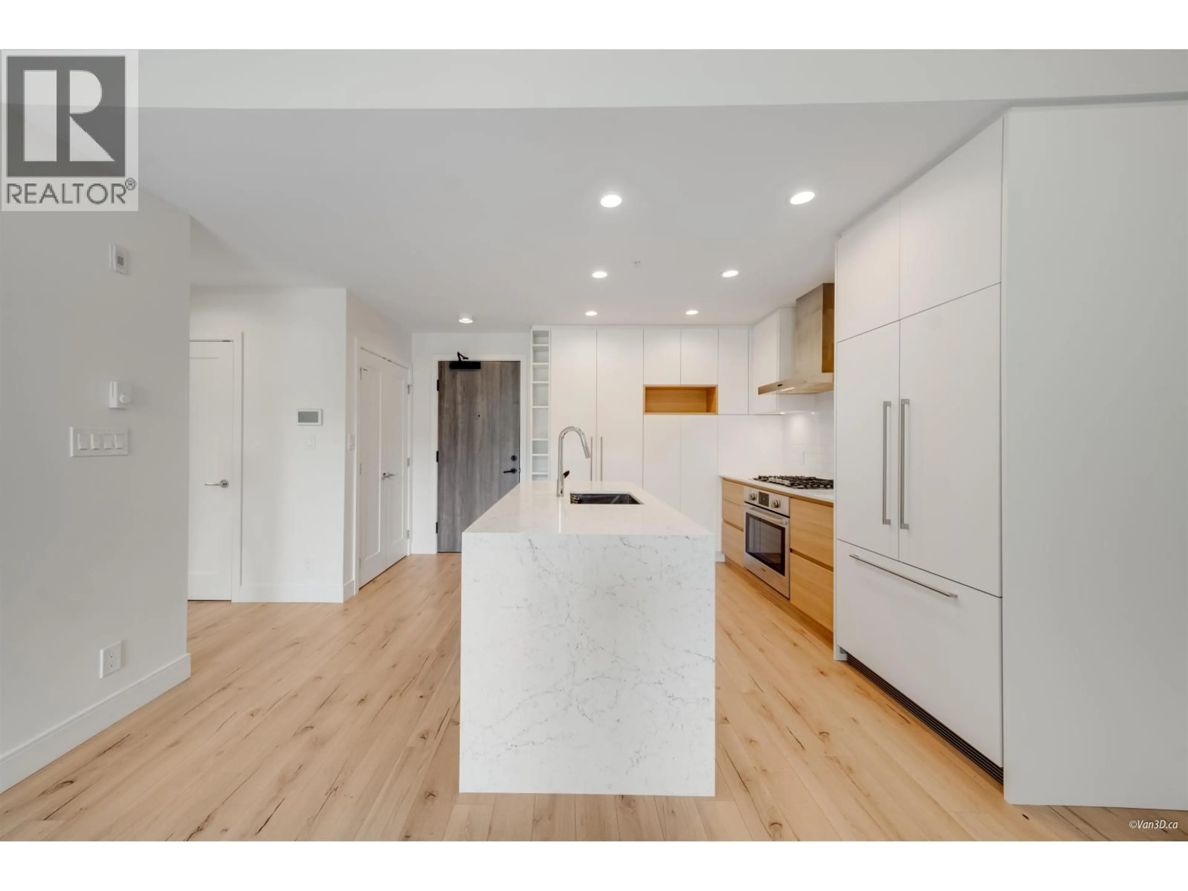 Open concept kitchen, wood/laminate floor for 201 - 55 KLAHANIE DRIVE, Port Moody British Columbia V3H0M9