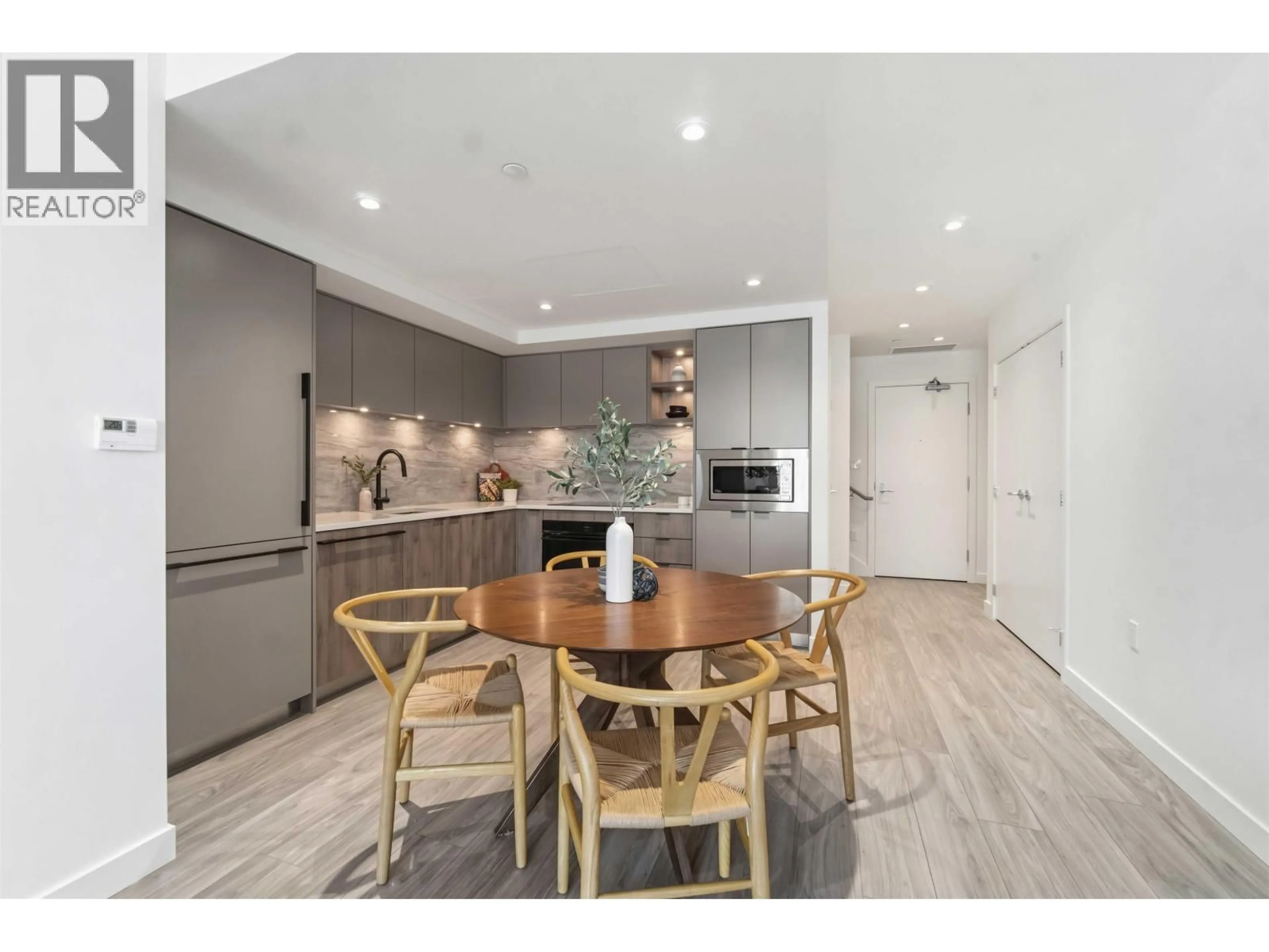 Open concept kitchen, unknown for TH 109 - 755 HARBOURSIDE DRIVE, North Vancouver British Columbia V7P0G1