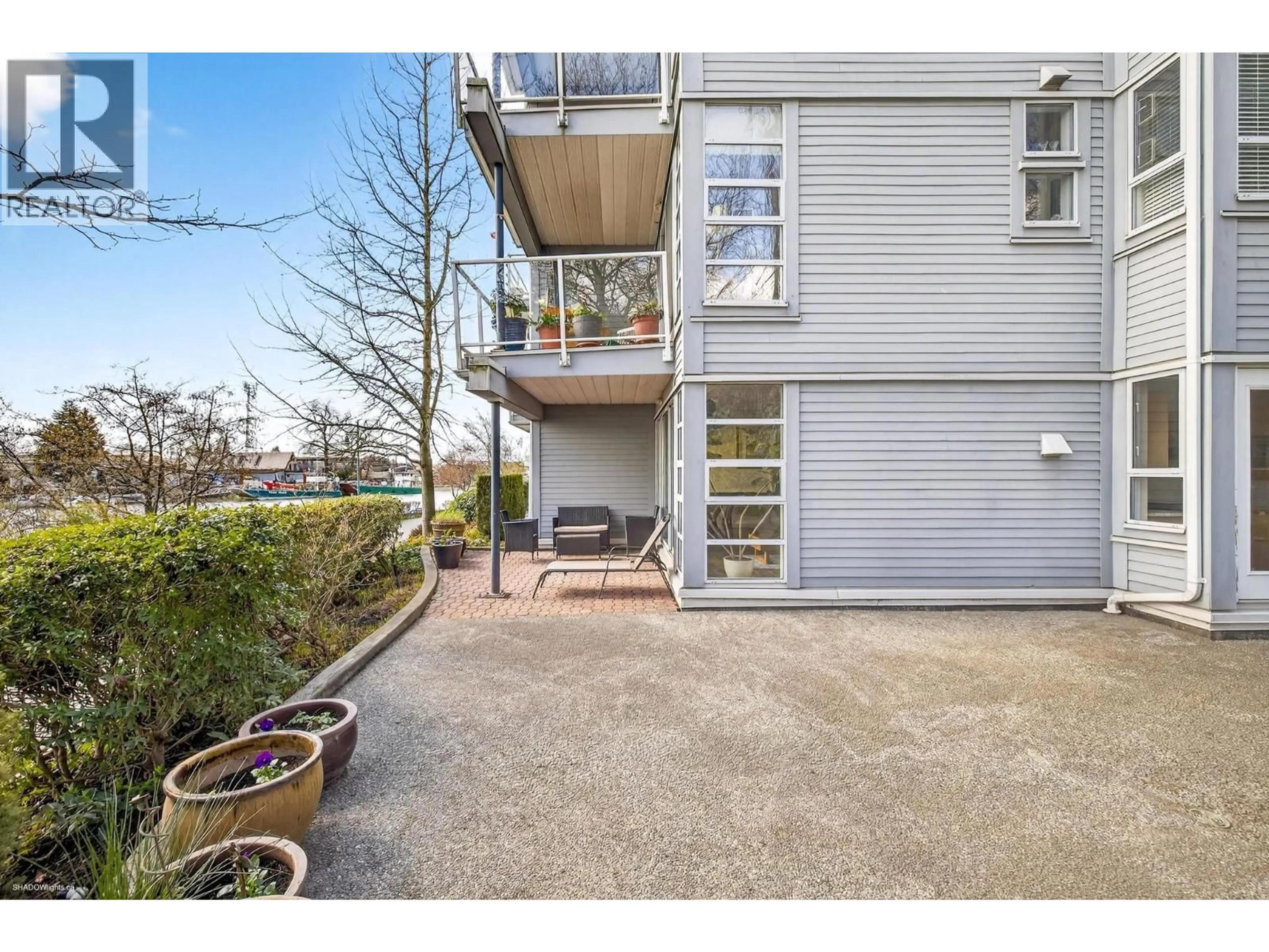 A pic from outside/outdoor area/front of a property/back of a property/a pic from drone, street for 108 - 1880 KENT AVENUE SOUTH AVENUE, Vancouver British Columbia V5P2S7