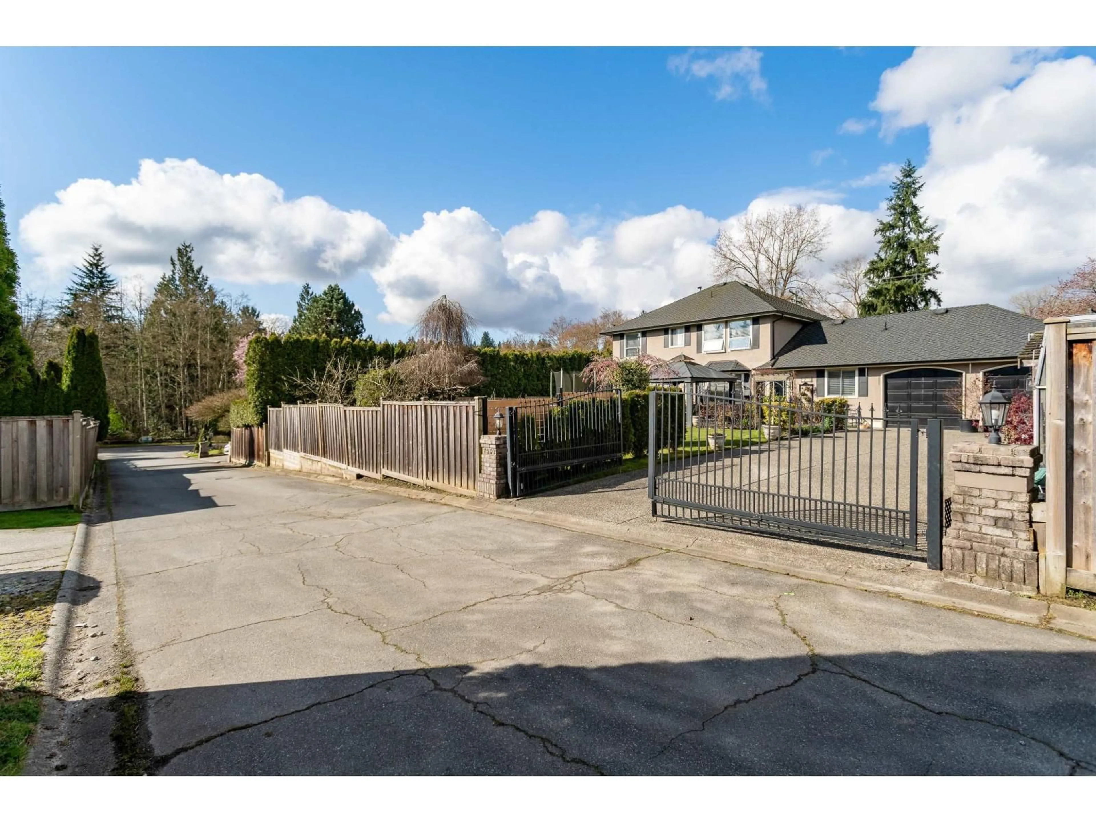 A pic from outside/outdoor area/front of a property/back of a property/a pic from drone, street for 7930 144 STREET, Surrey British Columbia V3W1K1
