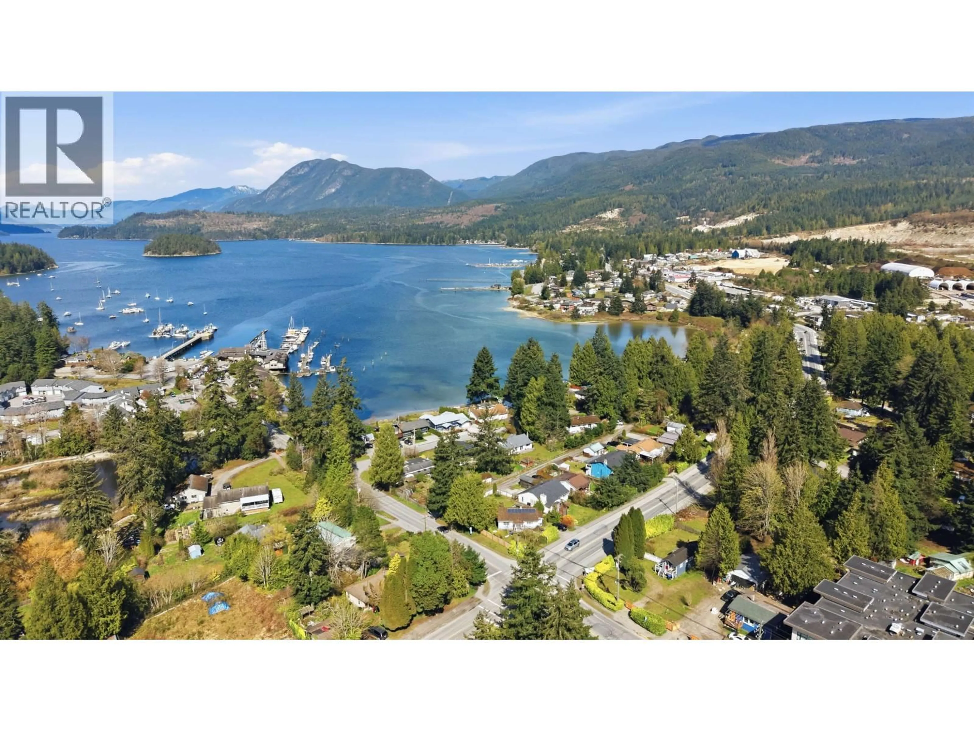 A pic from outside/outdoor area/front of a property/back of a property/a pic from drone, water/lake/river/ocean view for 5689 PORPOISE BAY ROAD, Sechelt British Columbia V0N1V0