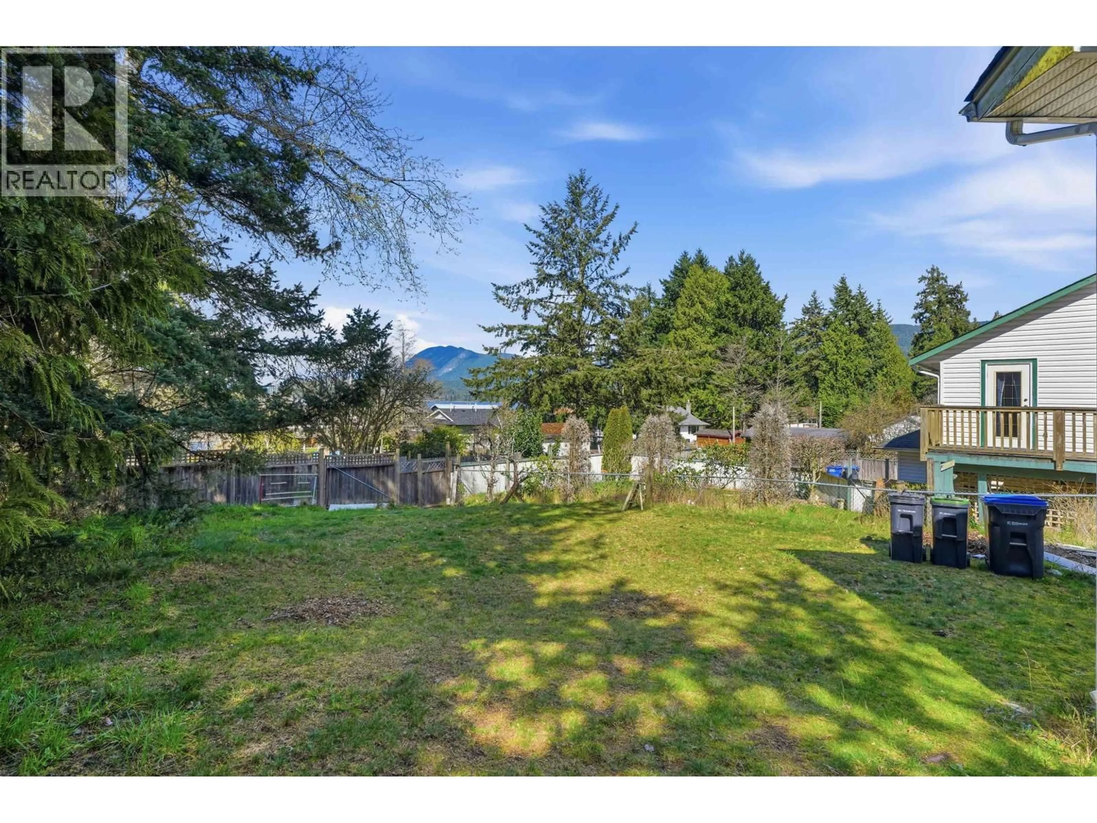 A pic from outside/outdoor area/front of a property/back of a property/a pic from drone, mountain view for 5689 PORPOISE BAY ROAD, Sechelt British Columbia V0N1V0