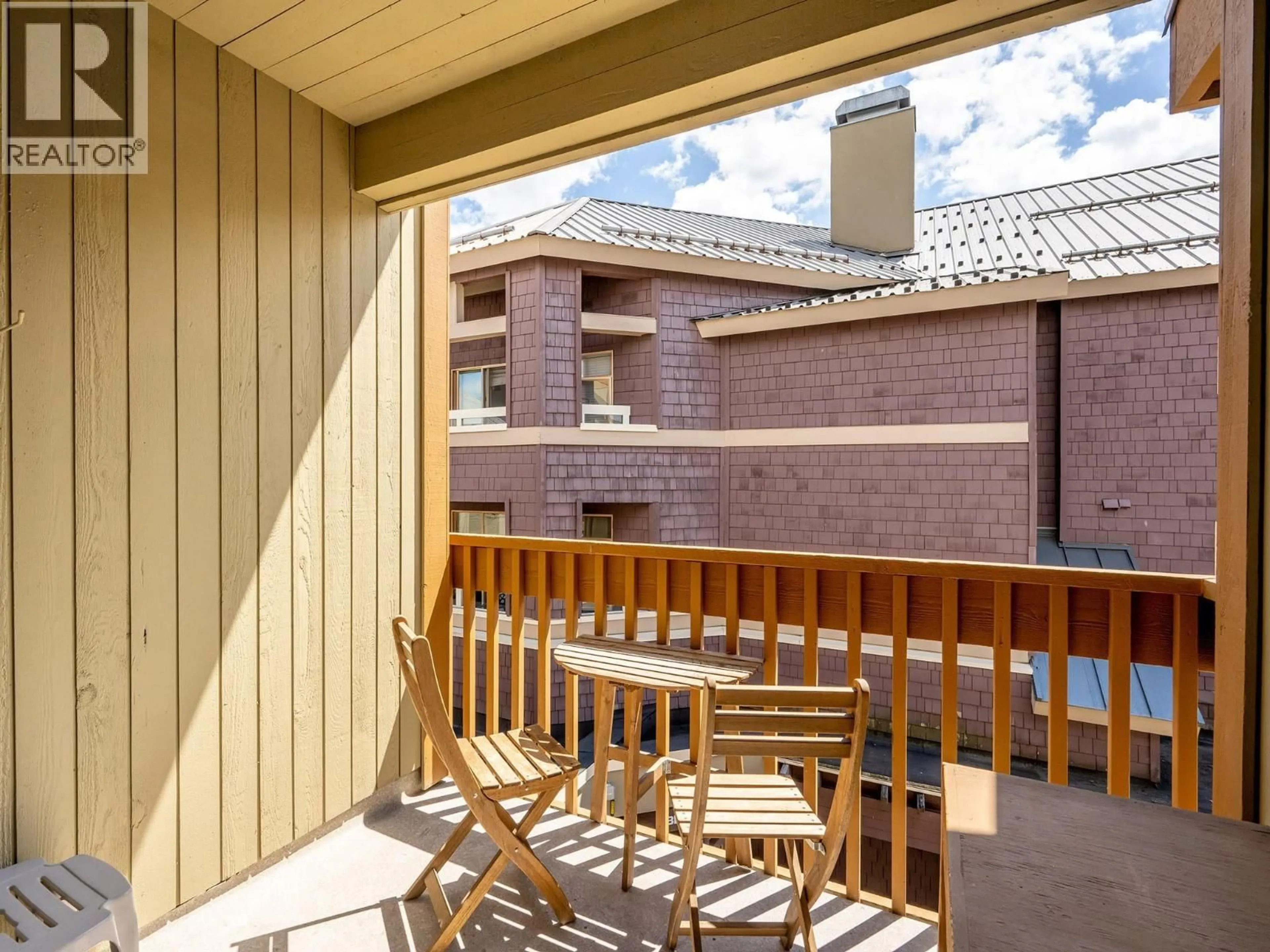 Balcony in the apartment, city buildings view from balcony for 347 - 4340 LORIMER ROAD, Whistler British Columbia V8E1A5