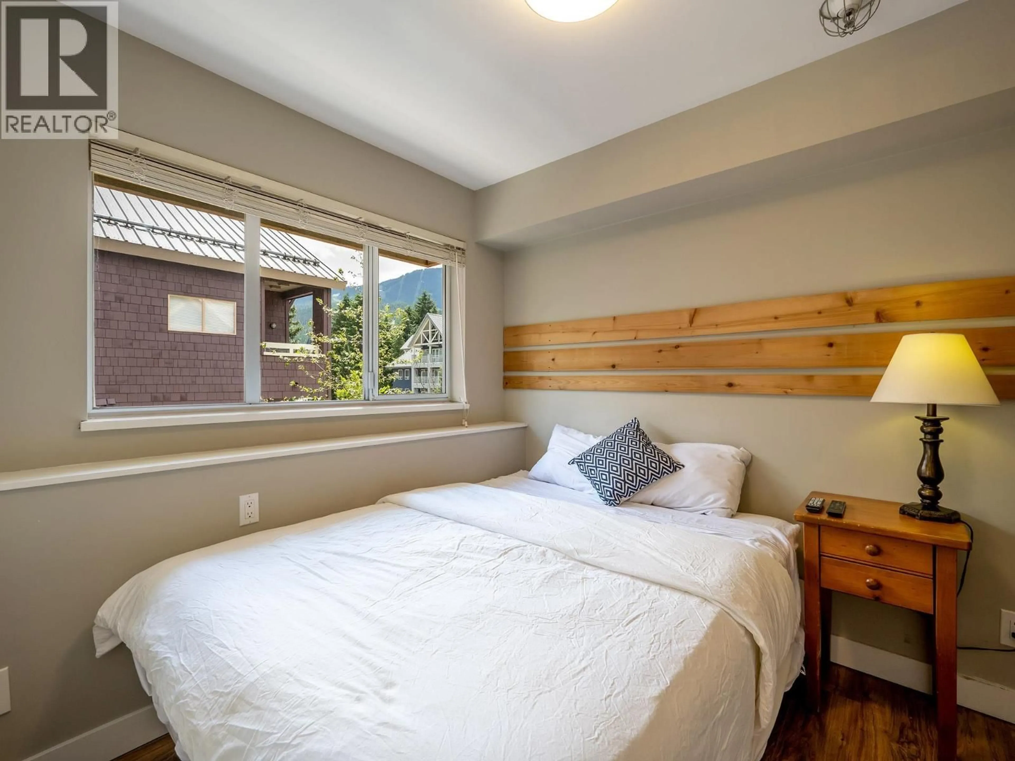 Bedroom with bed, wood/laminate floor for 347 - 4340 LORIMER ROAD, Whistler British Columbia V8E1A5