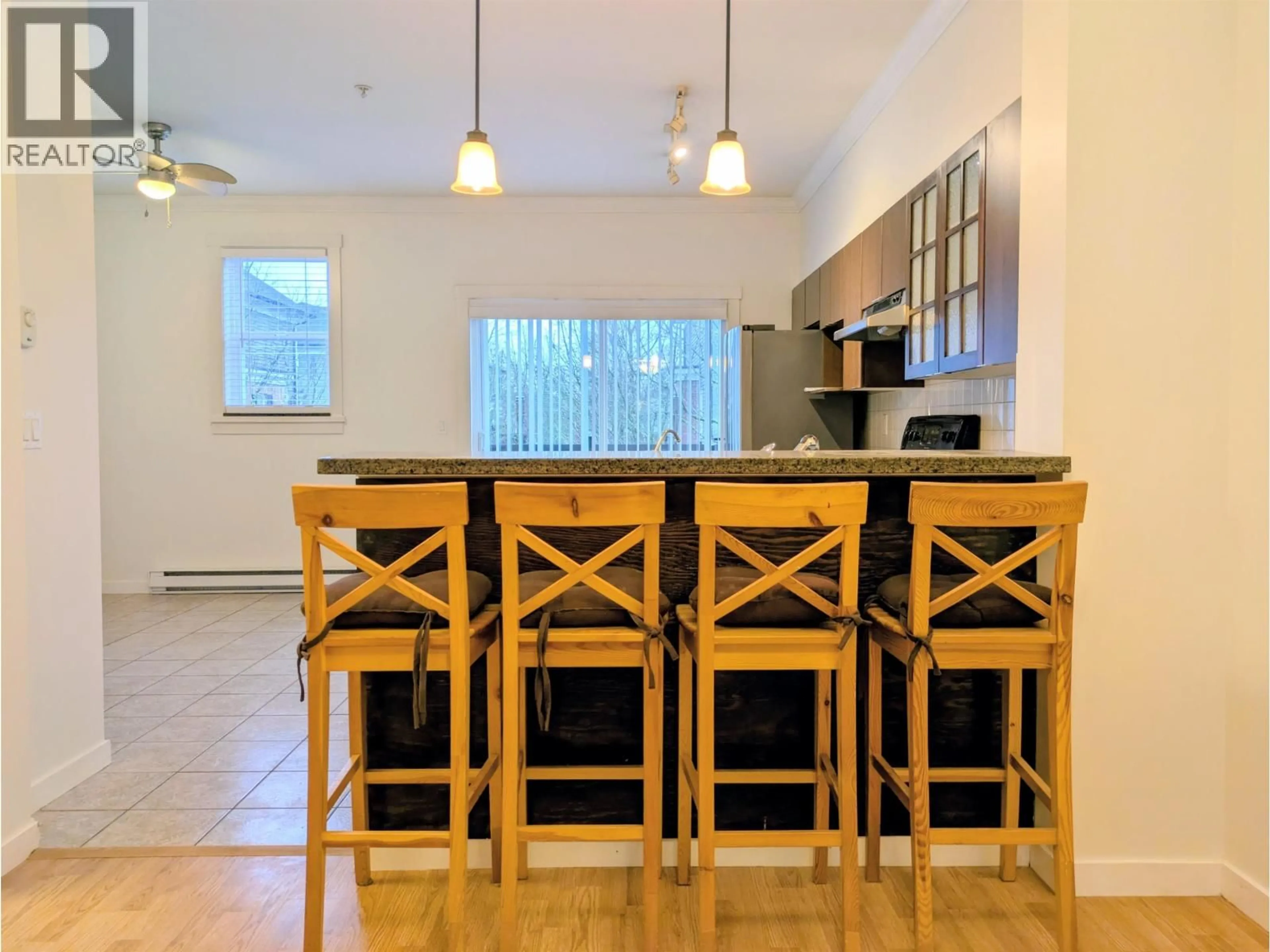 Open concept kitchen, wood/laminate floor for 58 - 19572 FRASER WAY, Pitt Meadows British Columbia V3Y0A9