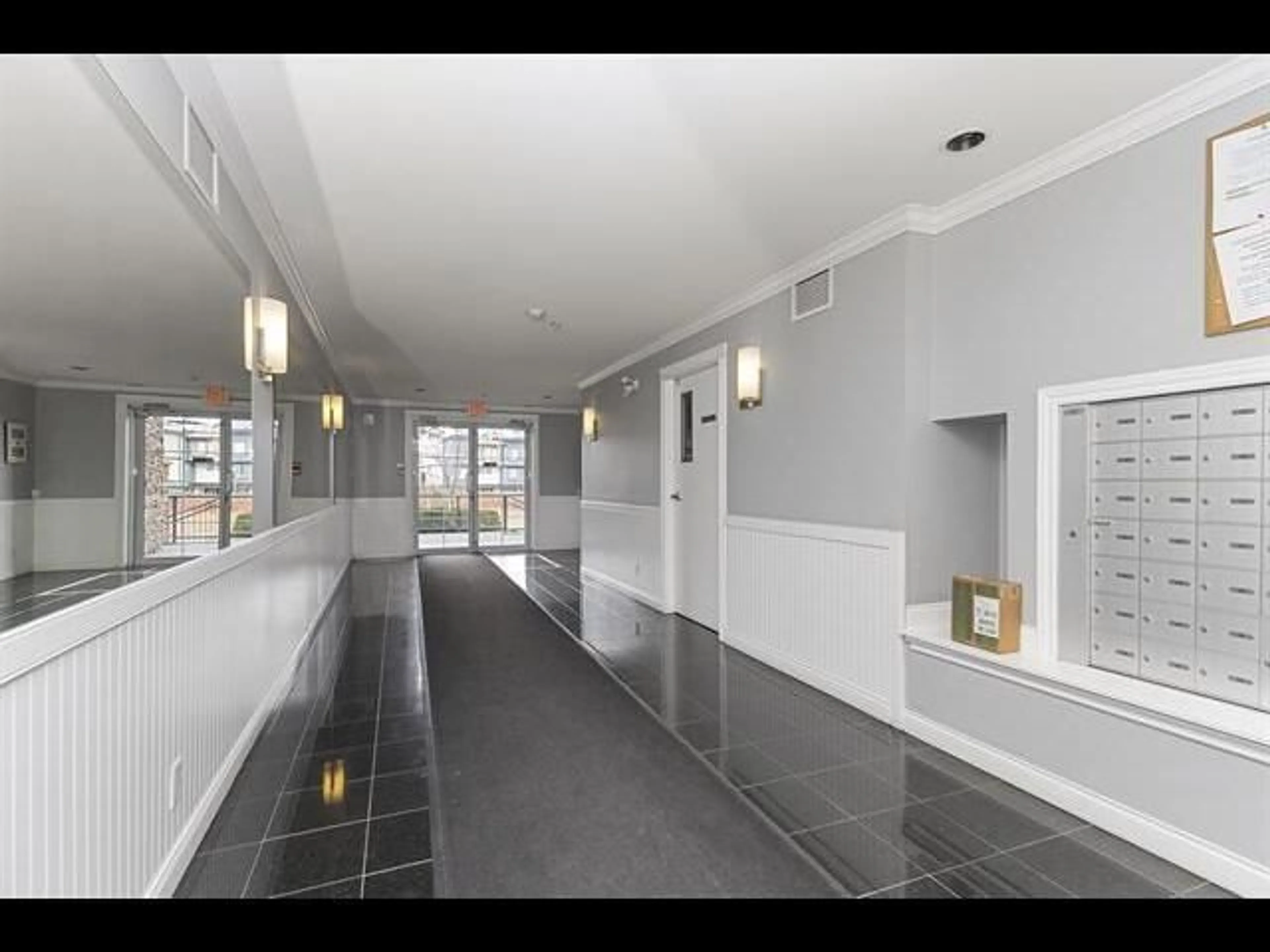 Indoor foyer for 114 - 19939 55A AVENUE, Langley British Columbia V4P1R9