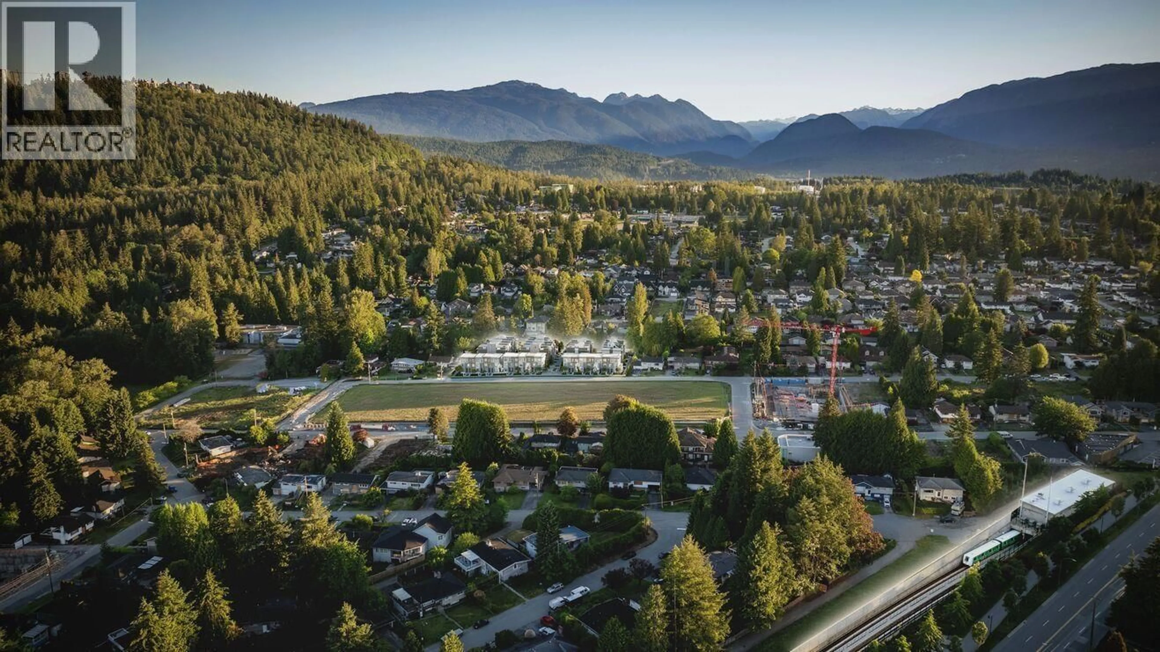 A pic from outside/outdoor area/front of a property/back of a property/a pic from drone, mountain view for 211 - 601 HARRISON AVENUE, Coquitlam British Columbia V3J3Z6