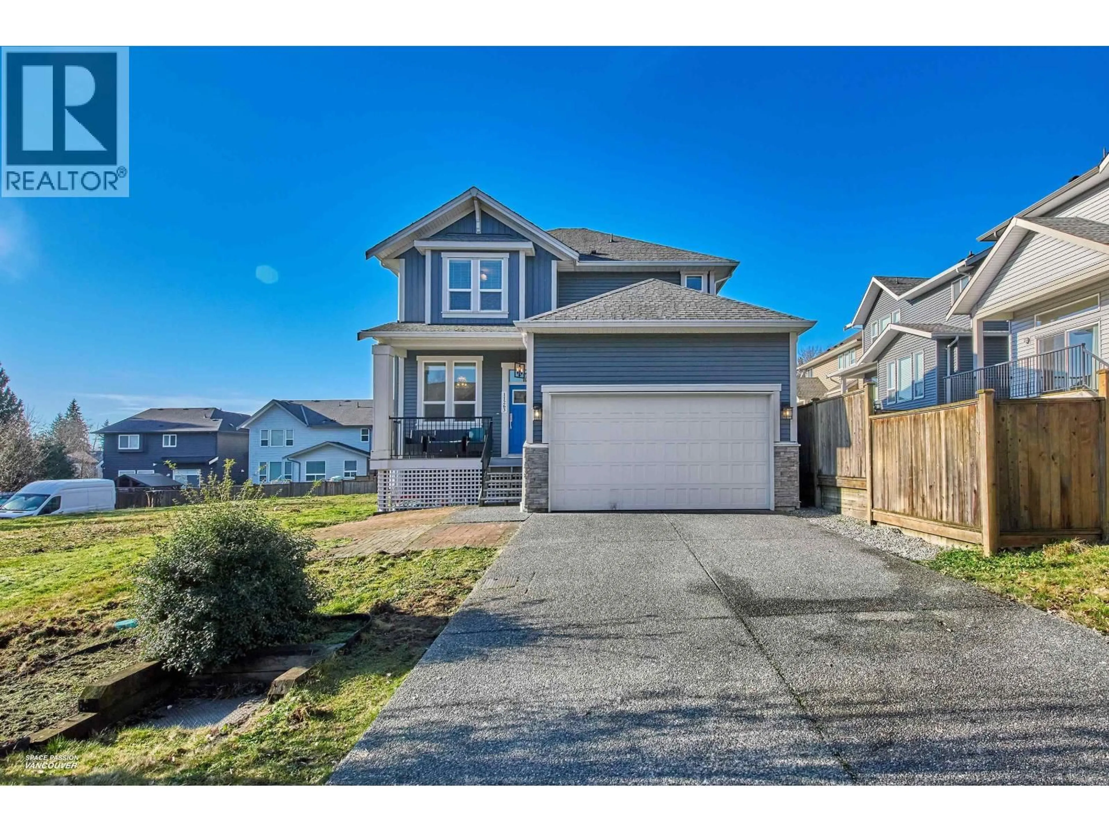 Home with vinyl exterior material, street for 11263 243B STREET, Maple Ridge British Columbia V2W1H5