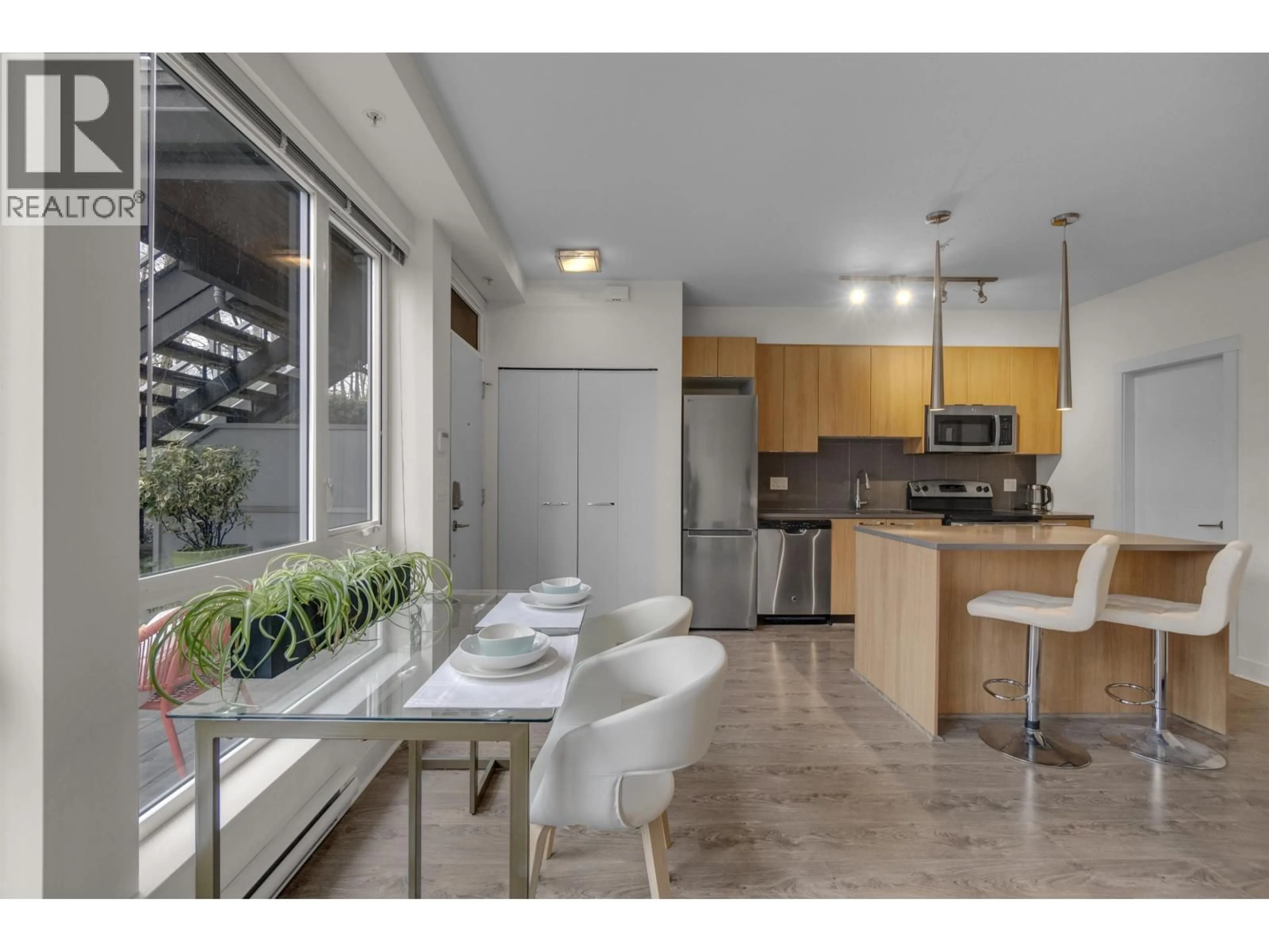 Open concept kitchen, unknown for 103 - 735 15TH STREET, North Vancouver British Columbia V7M0B8