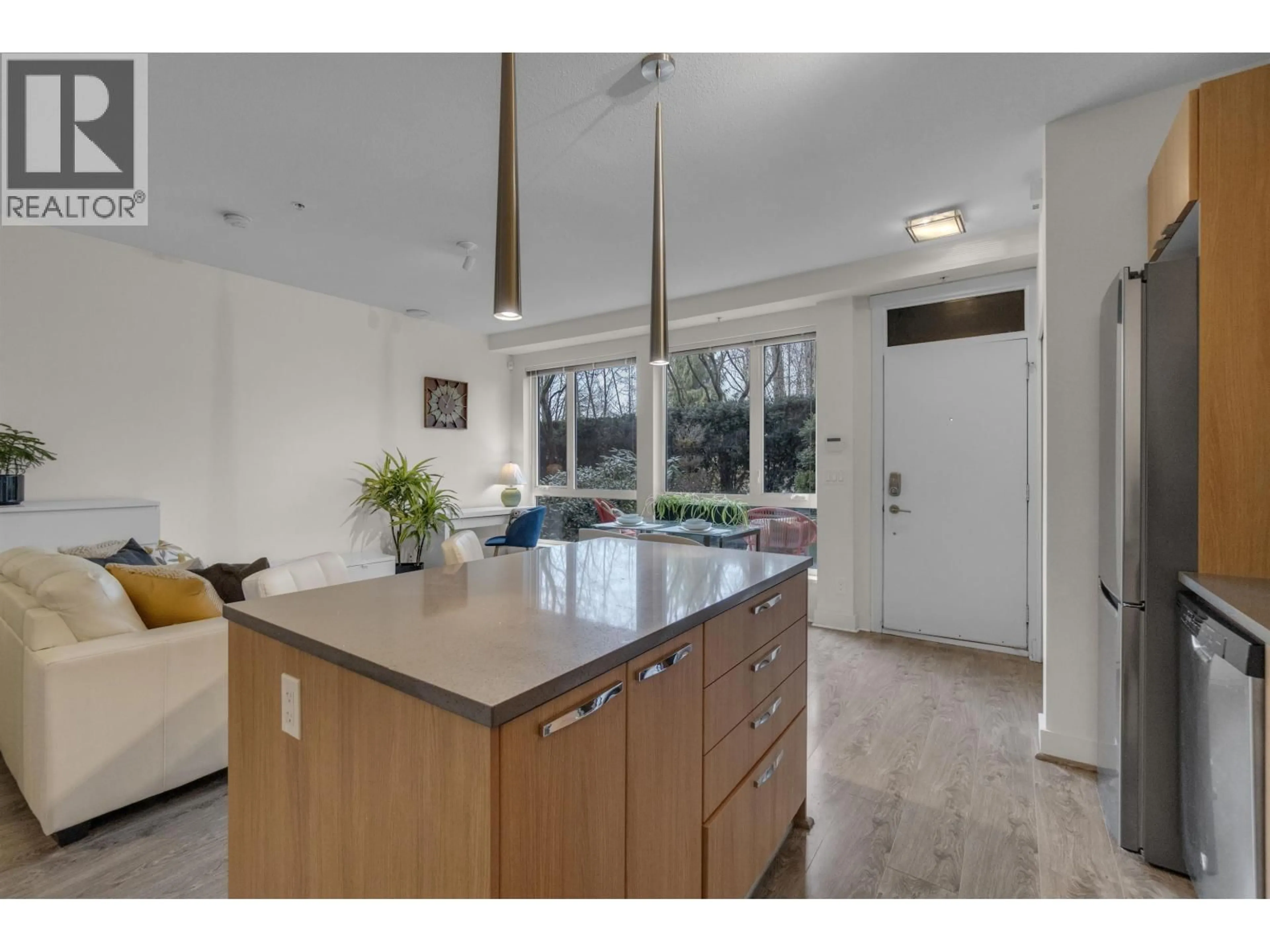 Open concept kitchen, unknown for 103 - 735 15TH STREET, North Vancouver British Columbia V7M0B8