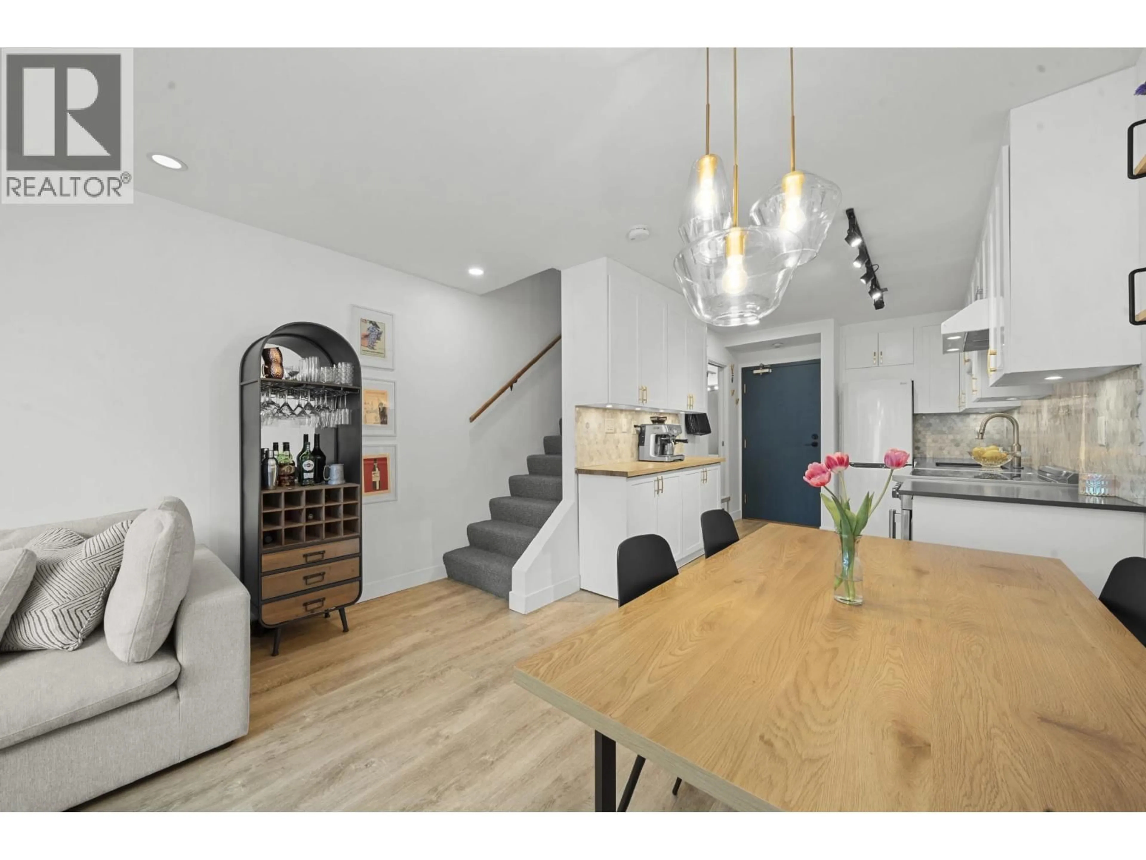 Open concept kitchen, wood/laminate floor for 109 - 2125 YORK AVENUE, Vancouver British Columbia V6K1C4