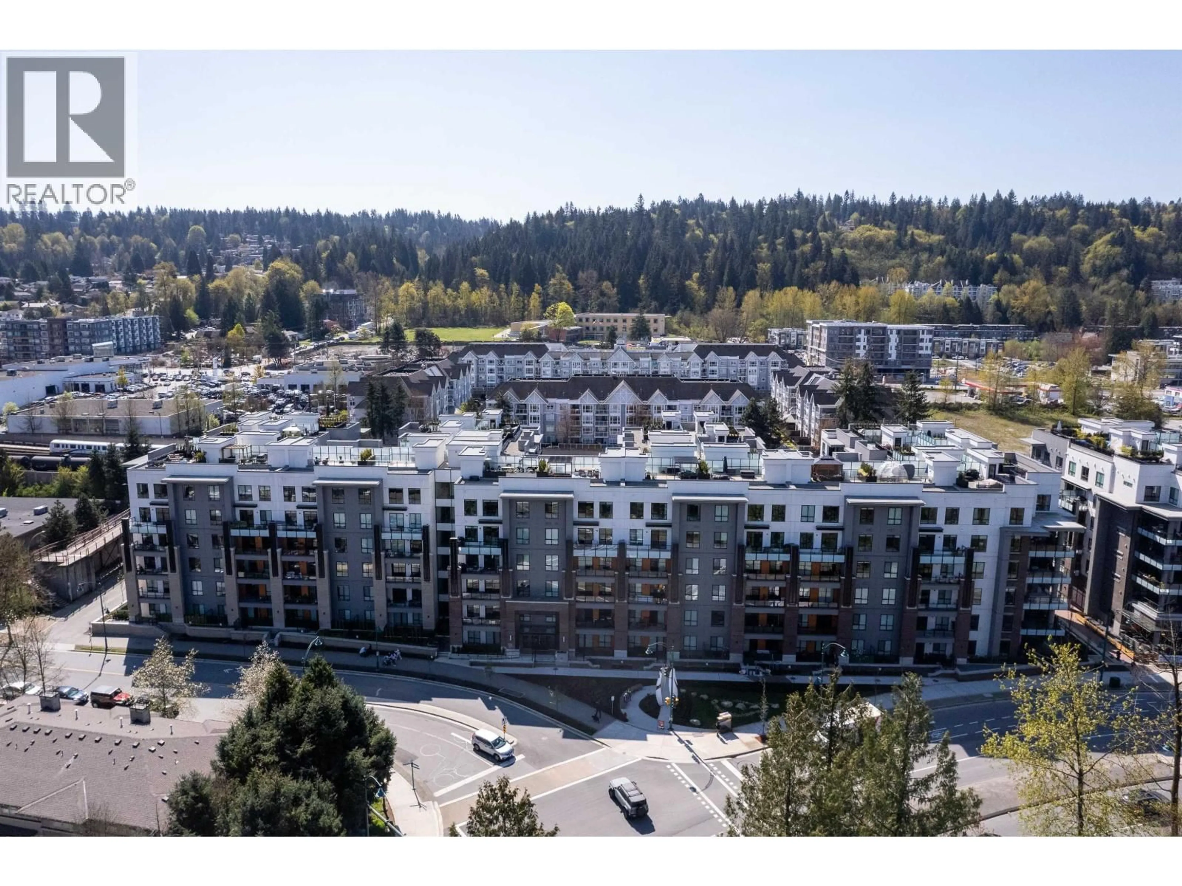 A pic from outside/outdoor area/front of a property/back of a property/a pic from drone, mountain view for 610 - 55 KLAHANIE DRIVE, Port Moody British Columbia V3H0M9