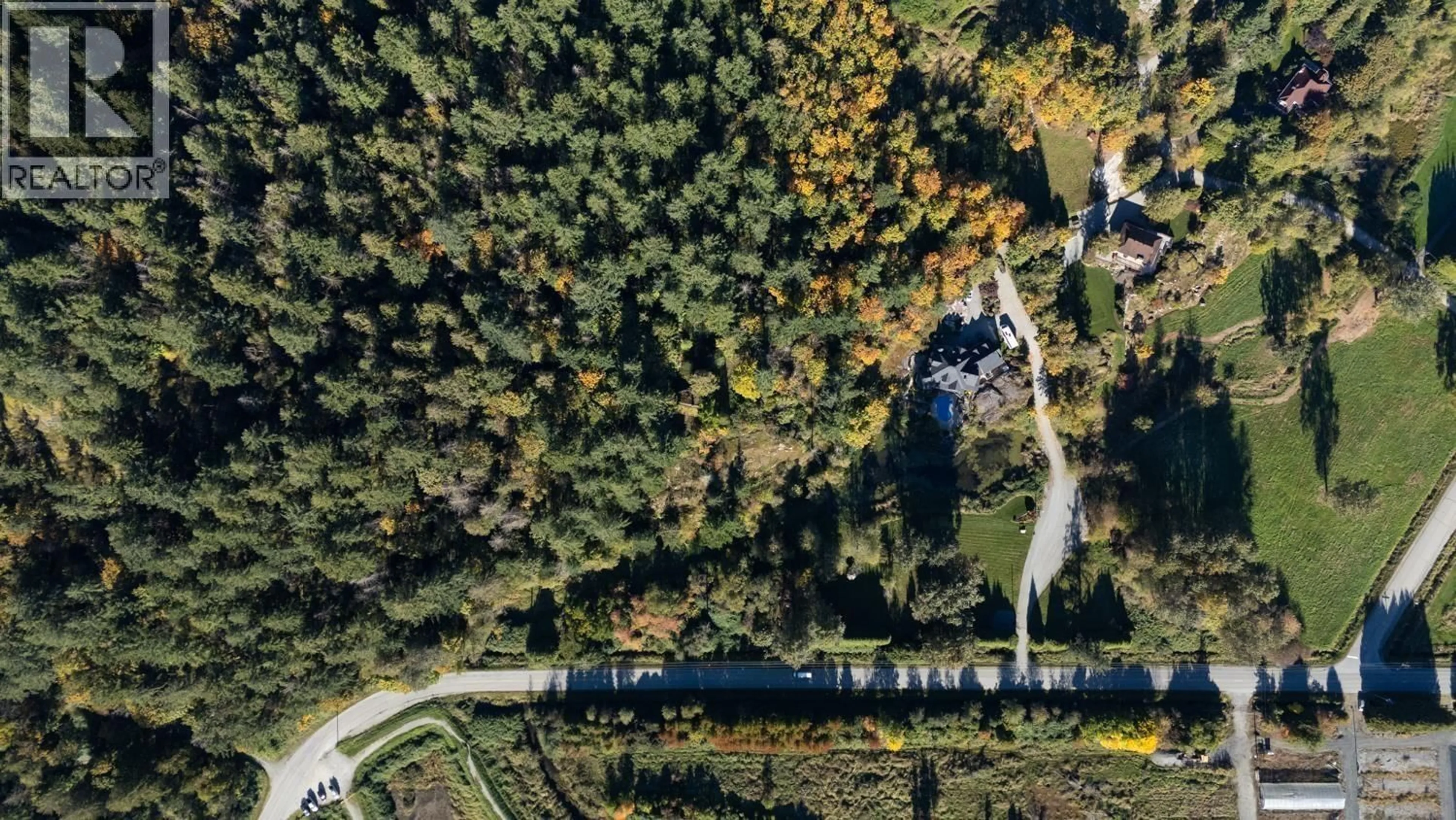 A pic from outside/outdoor area/front of a property/back of a property/a pic from drone, forest/trees view for 20255 MENZIES ROAD, Pitt Meadows British Columbia V3Y2T9