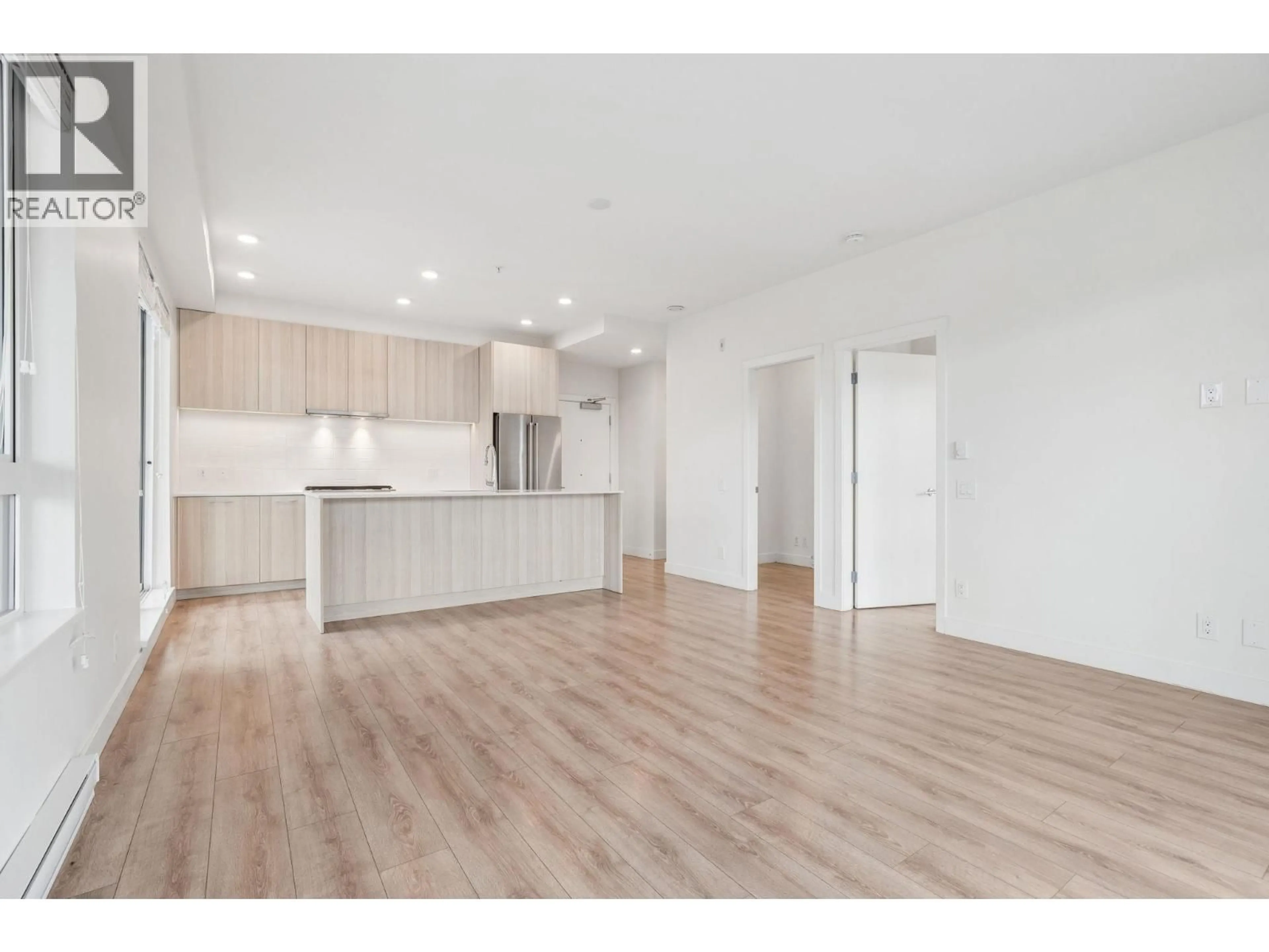 Open concept kitchen, wood/laminate floor for 508 - 721 ANSKAR COURT, Coquitlam British Columbia V3J0L4