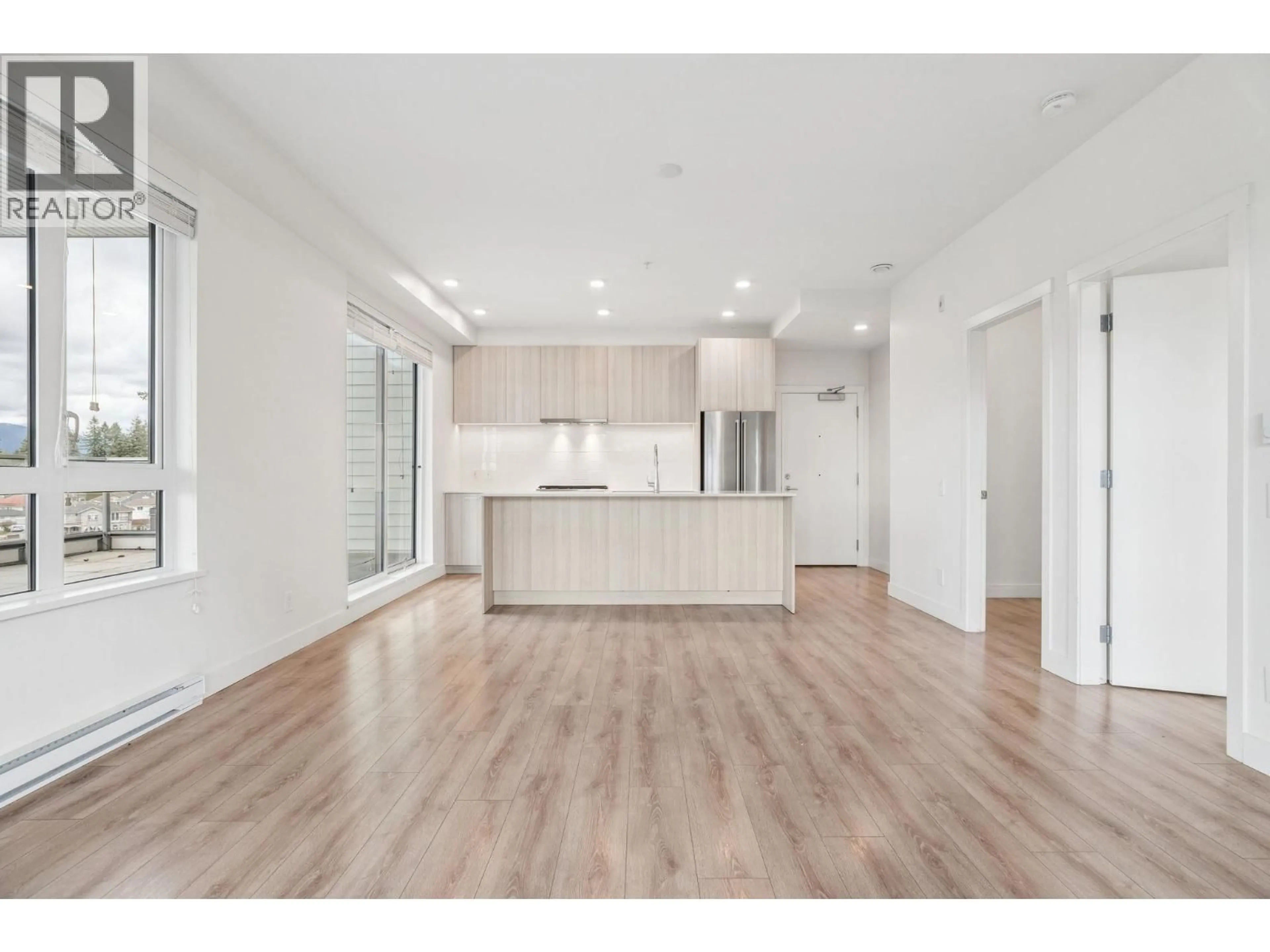 Open concept kitchen, wood/laminate floor for 508 - 721 ANSKAR COURT, Coquitlam British Columbia V3J0L4