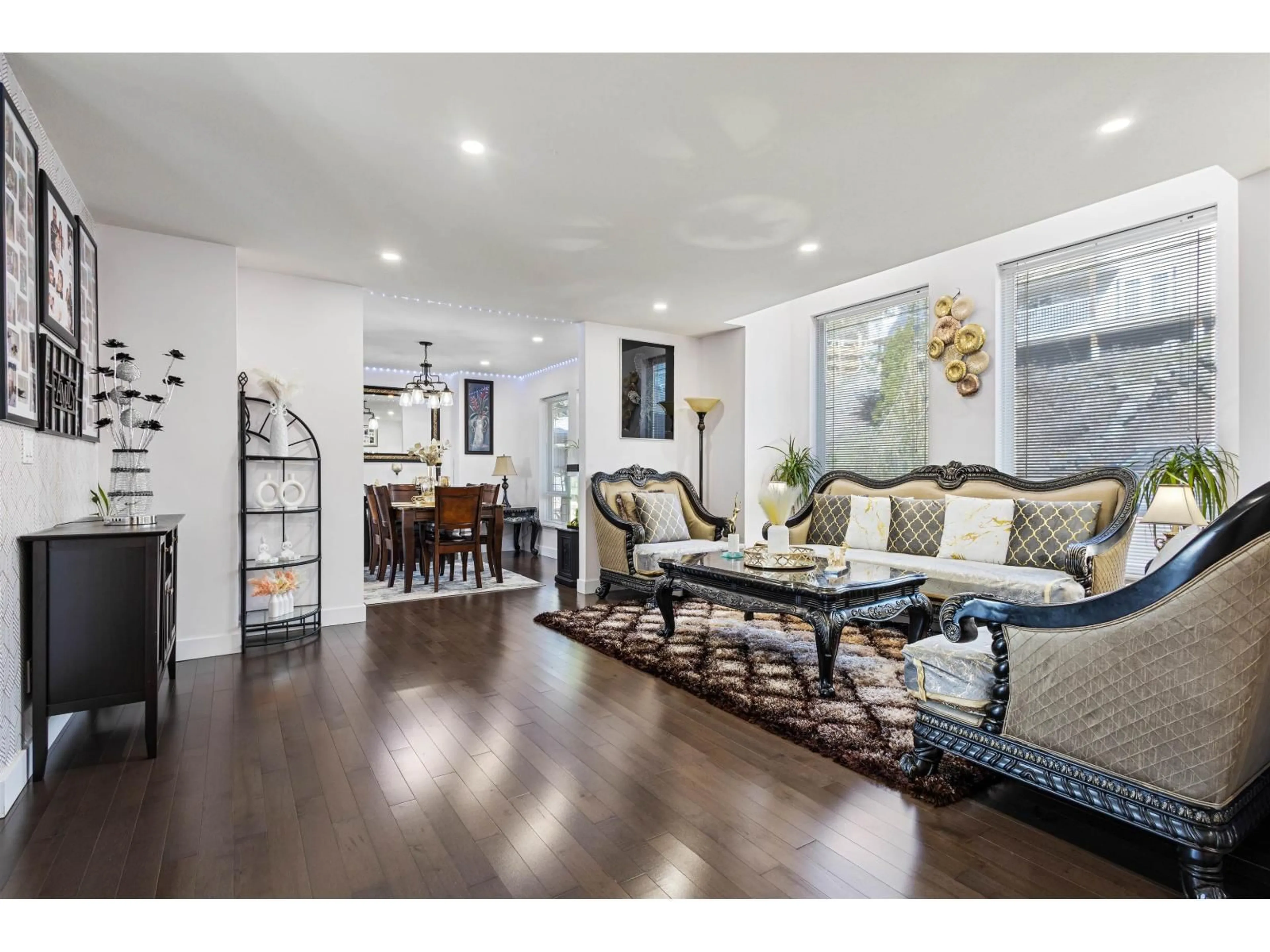 Living room with furniture, wood/laminate floor for 2772 ST MORITZ WAY, Abbotsford British Columbia V3G1C3