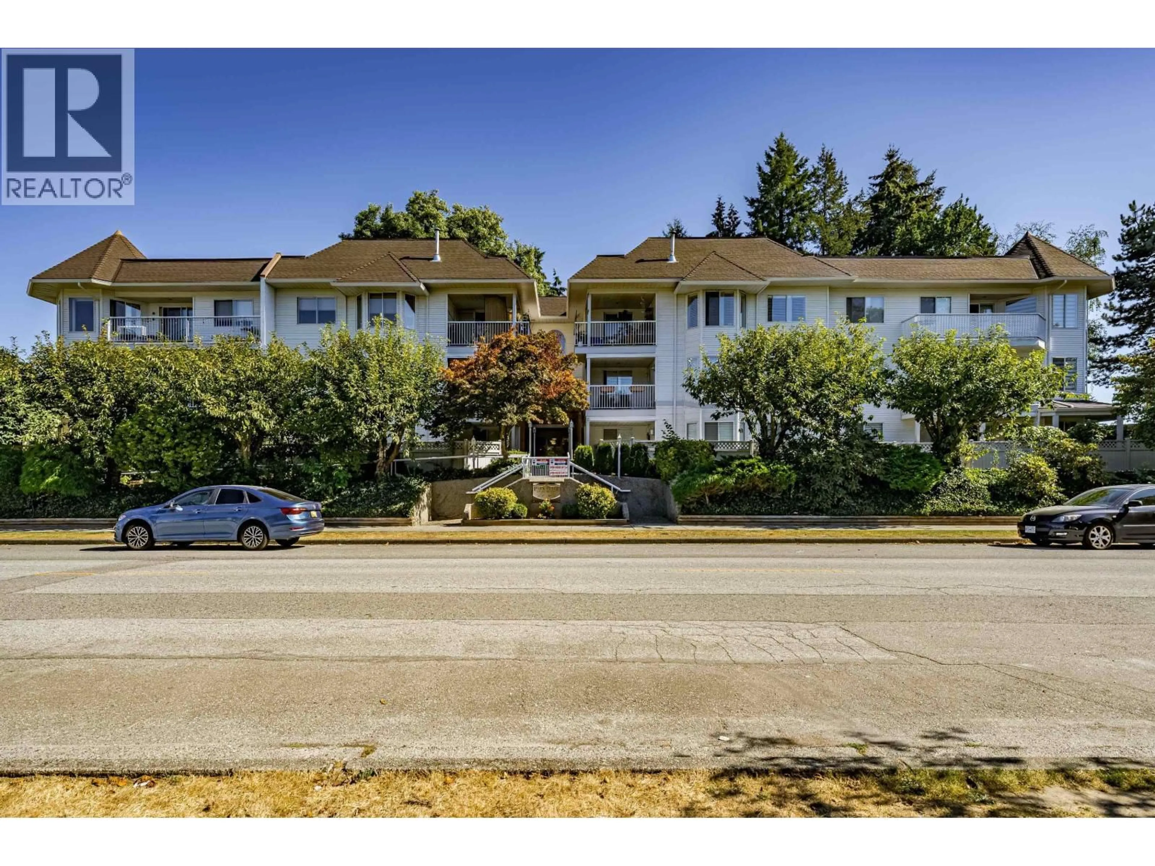 A pic from outside/outdoor area/front of a property/back of a property/a pic from drone, street for 103 - 3088 FLINT STREET, Port Coquitlam British Columbia V3B4H5