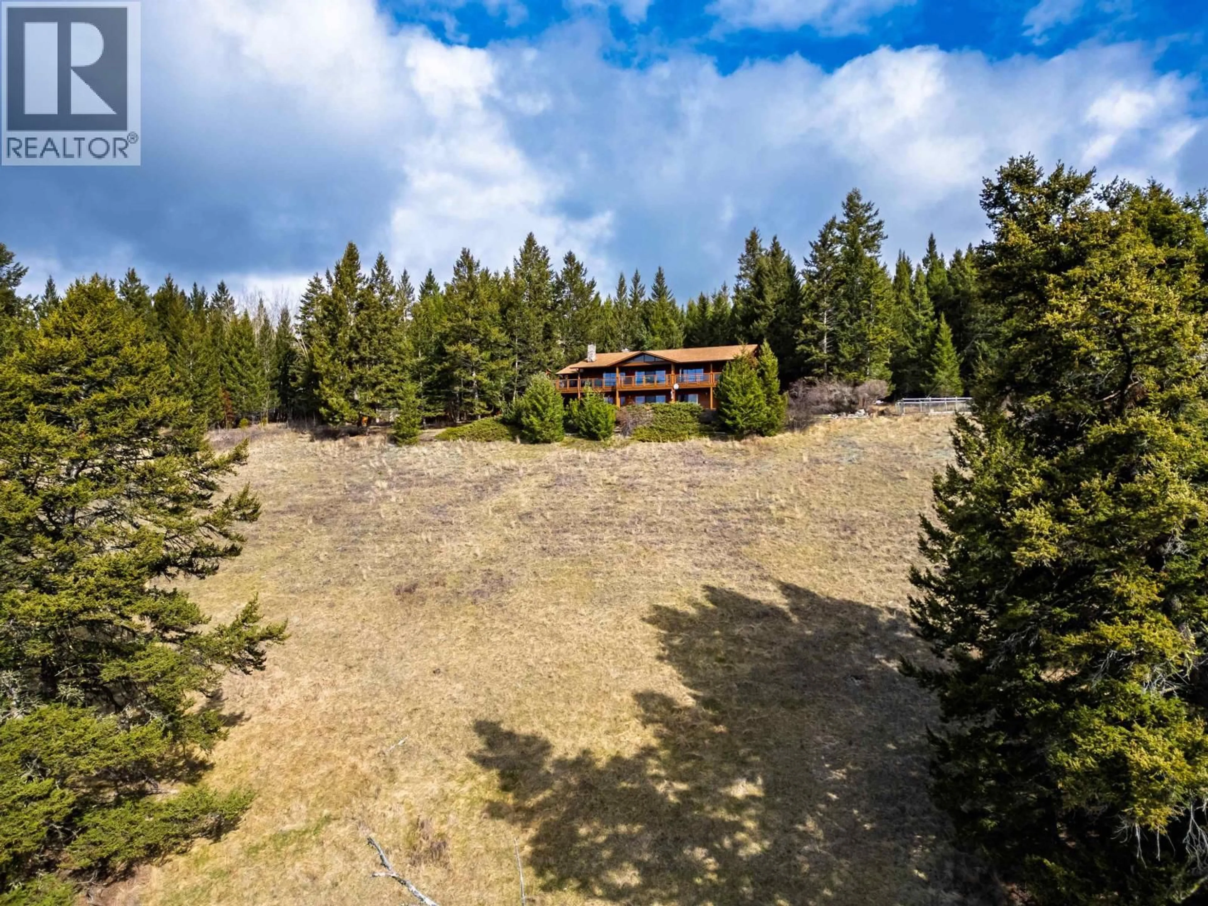 A pic from outside/outdoor area/front of a property/back of a property/a pic from drone, forest/trees view for 6342 NORTHSHORE DRIVE, Horse Lake British Columbia V0K2E3