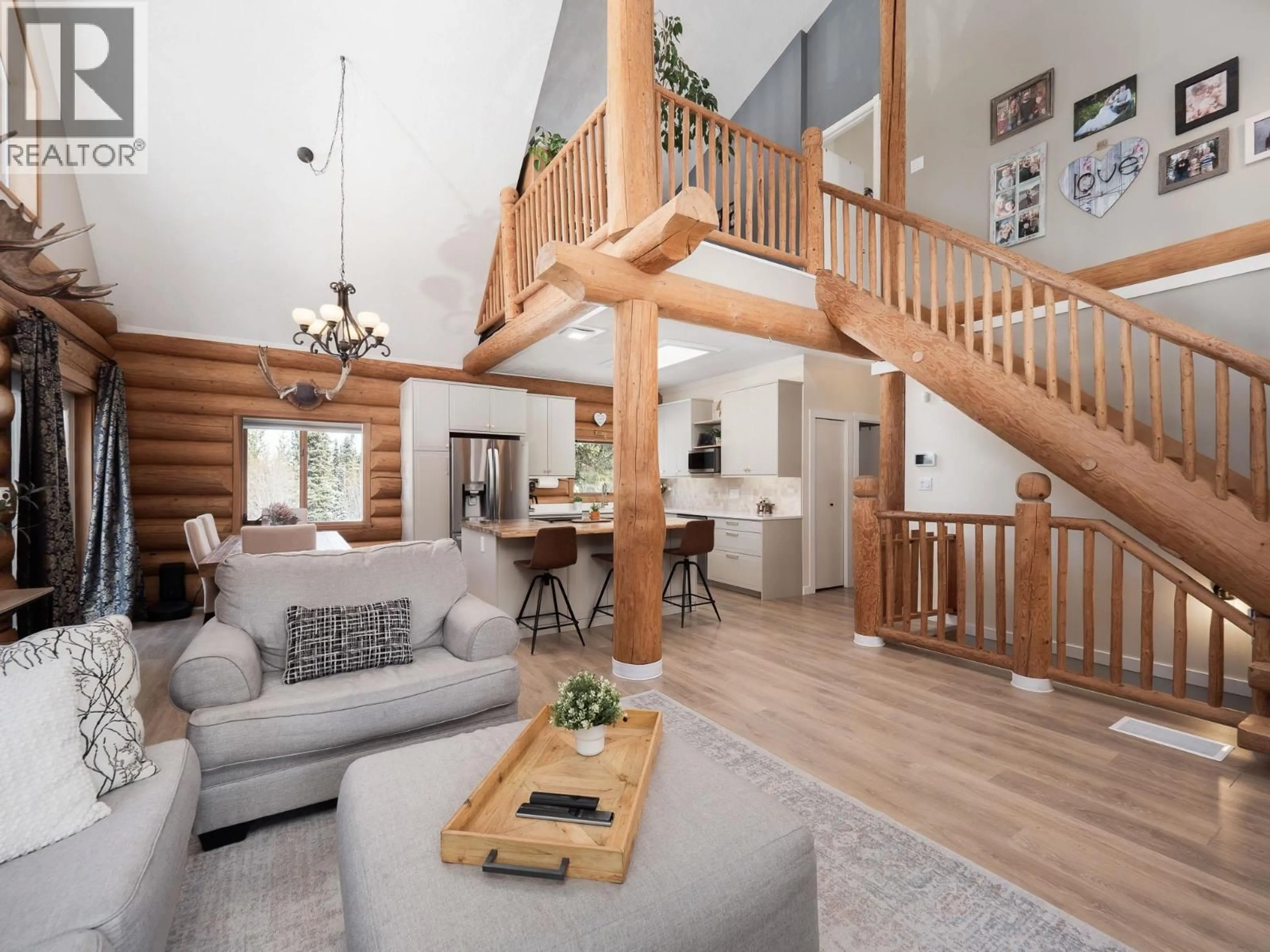 Living room with furniture, wood/laminate floor for 13020 MARVIN ROAD, Prince George British Columbia V2N5B6