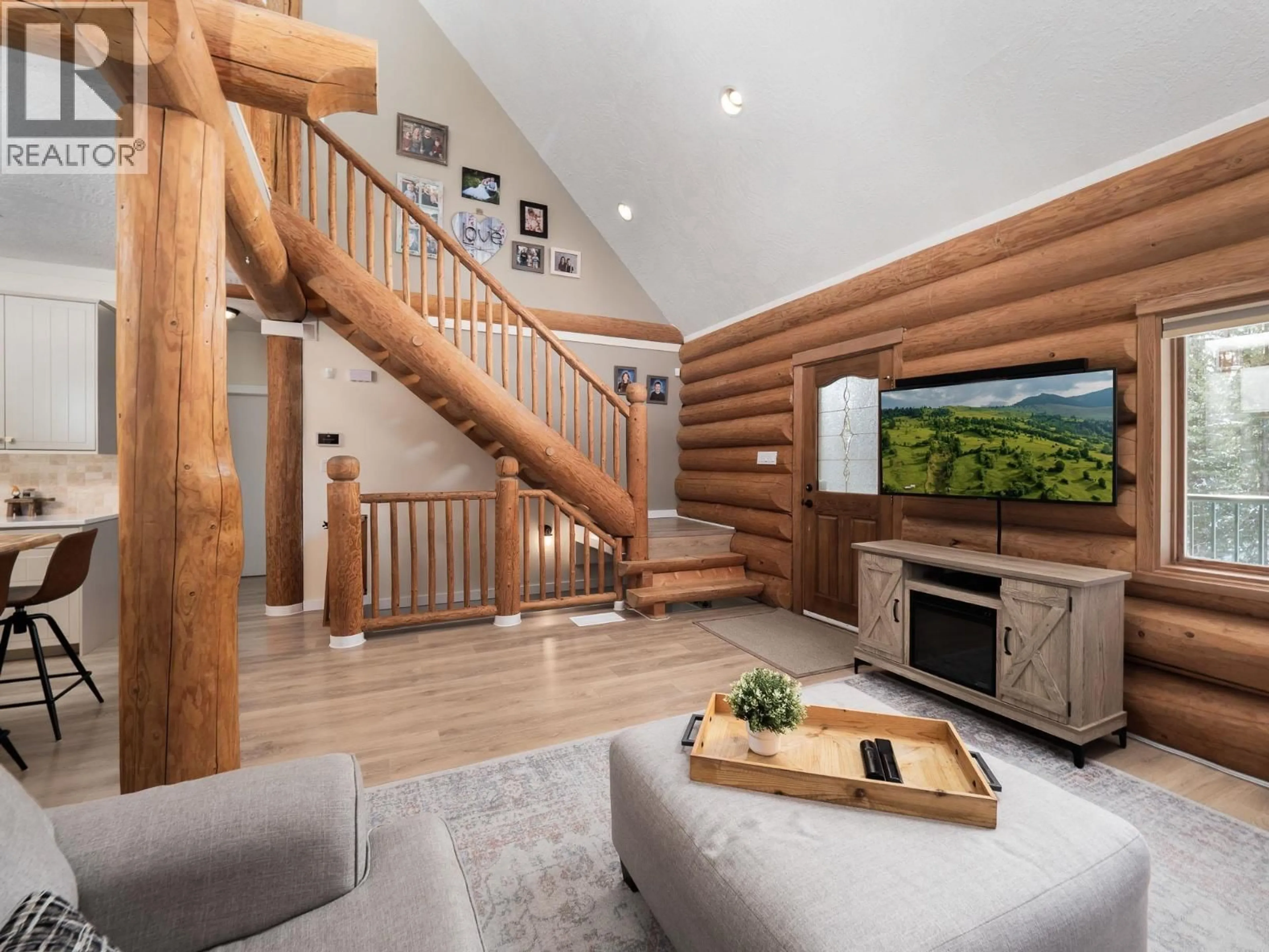 Living room with furniture, wood/laminate floor for 13020 MARVIN ROAD, Prince George British Columbia V2N5B6