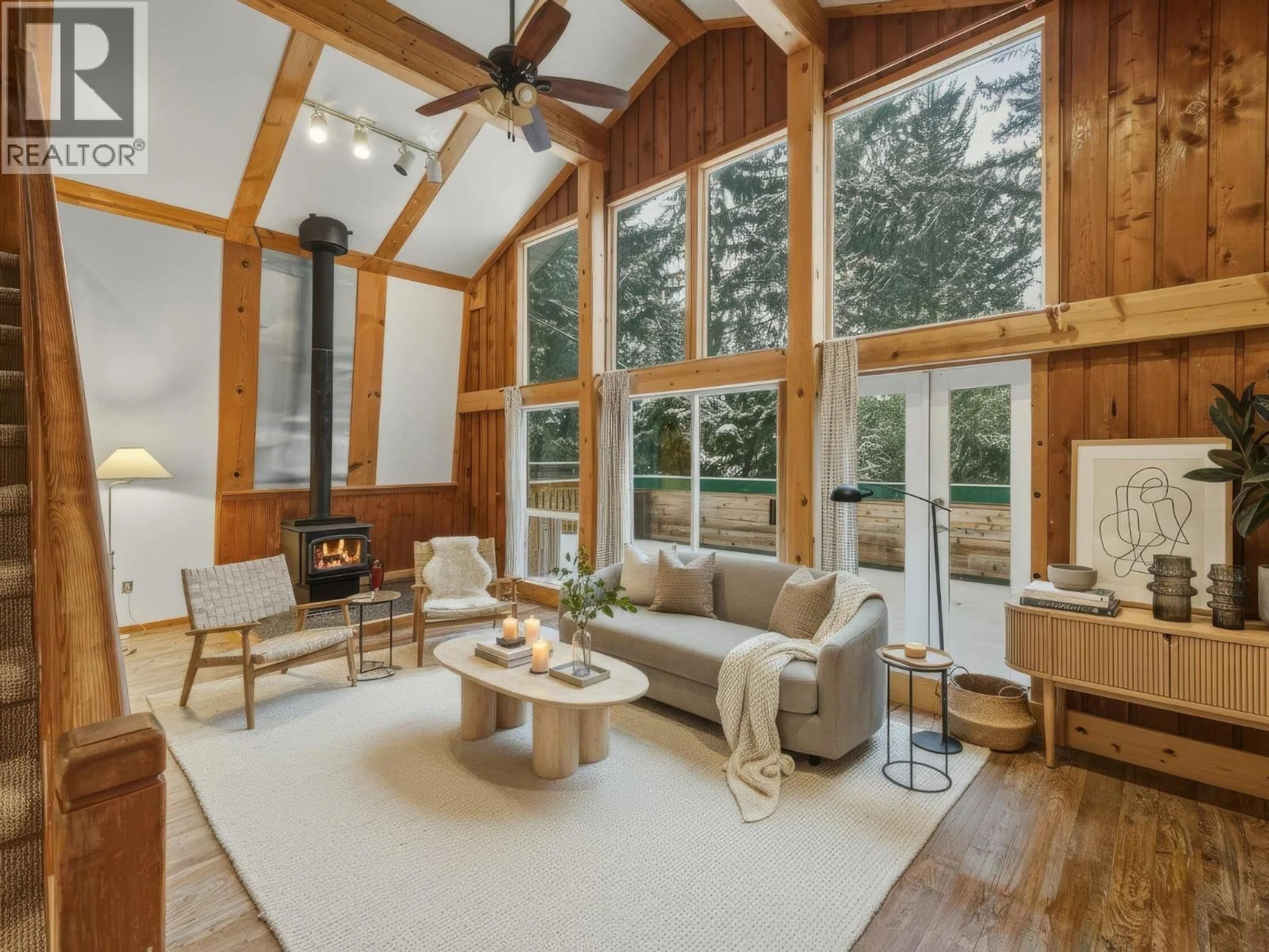 Living room with furniture, wood/laminate floor for 9539 EMERALD DRIVE, Whistler British Columbia V8E0G5