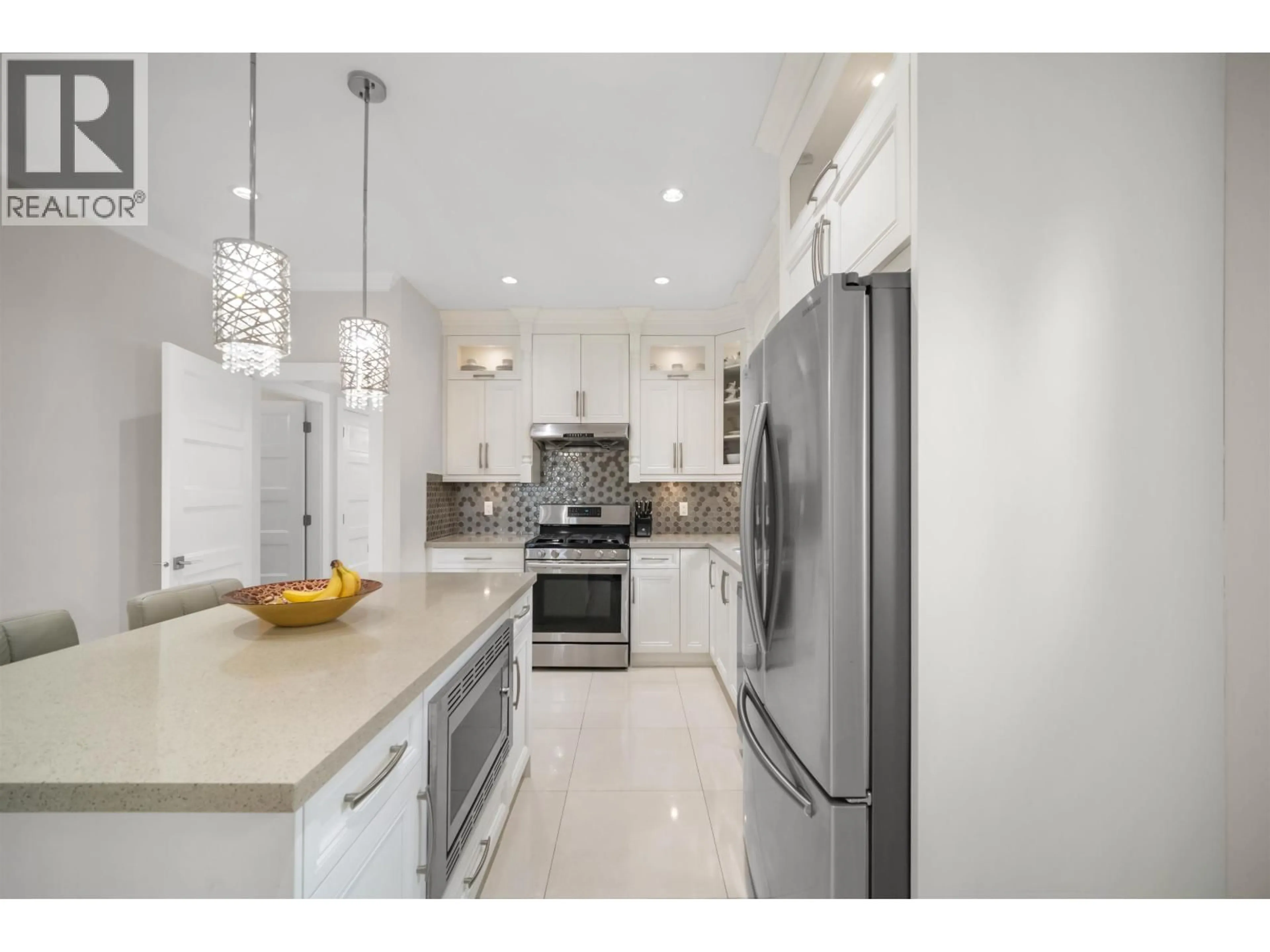 Contemporary kitchen, ceramic/tile floor for 4986 INMAN AVENUE, Burnaby British Columbia V5G2Y6