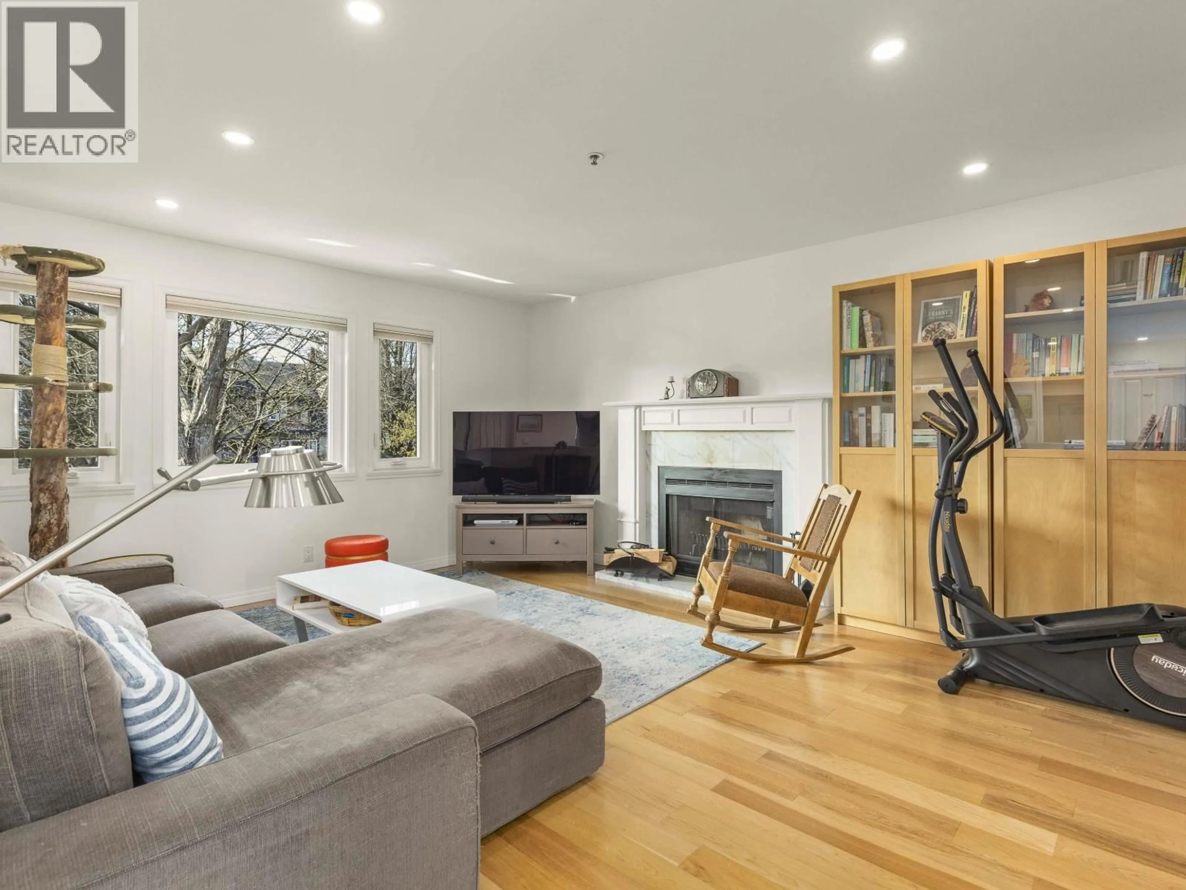 Living room with furniture, wood/laminate floor for 1815 14TH AVENUE, Vancouver British Columbia V6J2J8