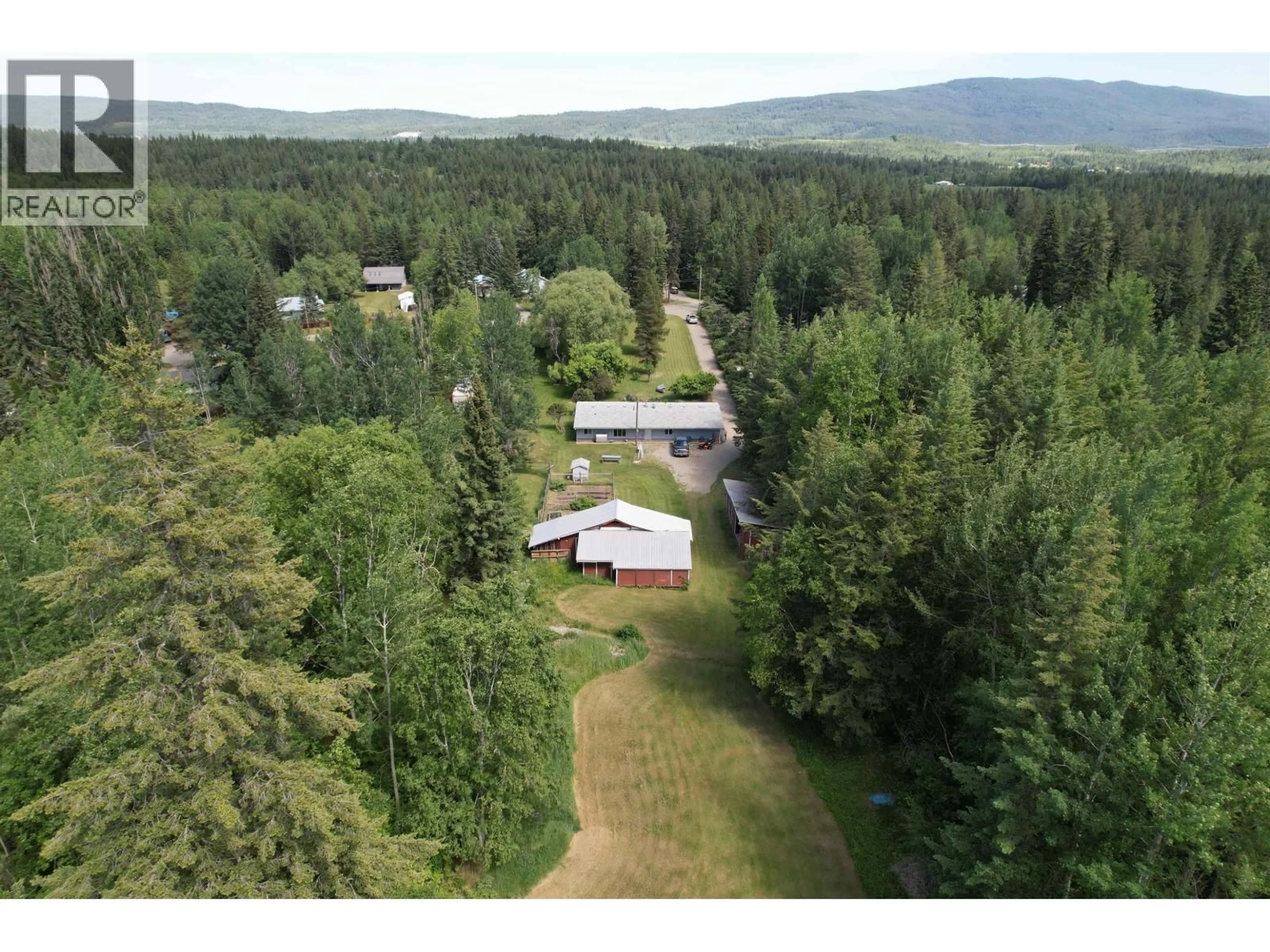 A pic from outside/outdoor area/front of a property/back of a property/a pic from drone, forest/trees view for 3074 RED BLUFF ROAD, Quesnel British Columbia V2J6C6