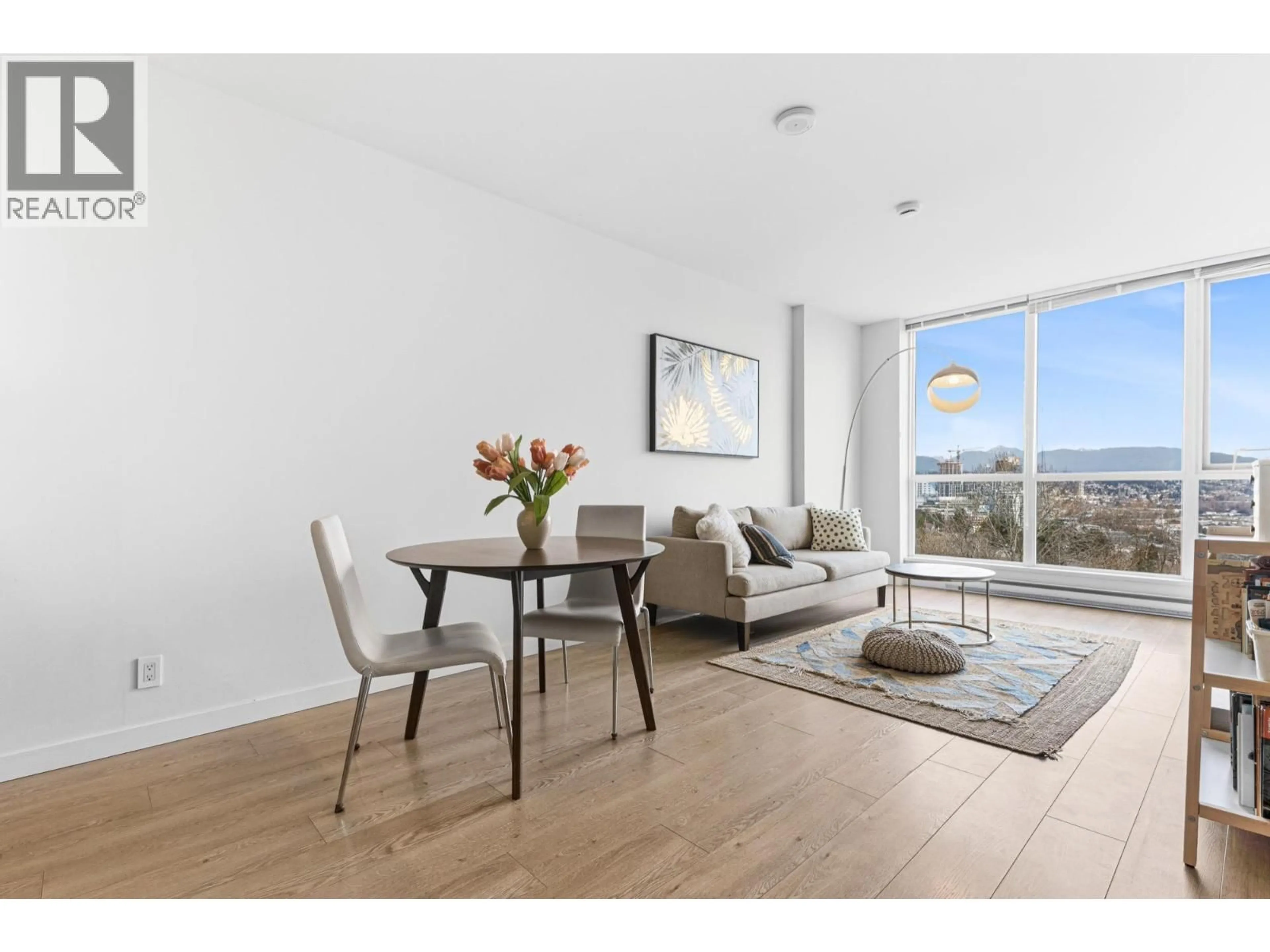 Living room with furniture, wood/laminate floor for 1012 - 271 FRANCIS WAY, New Westminster British Columbia V3L0H2