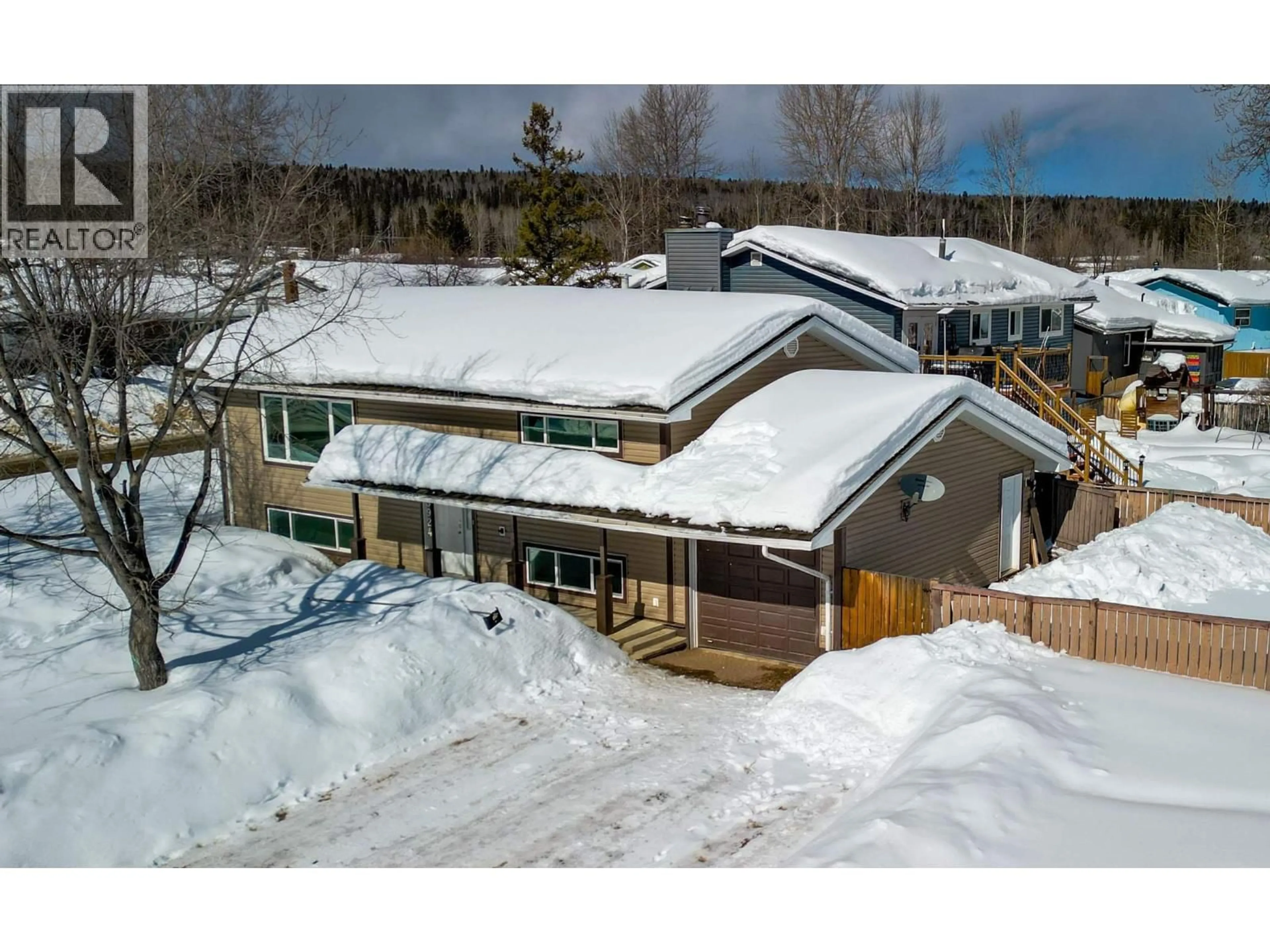 A pic from outside/outdoor area/front of a property/back of a property/a pic from drone, unknown for 3924 53 AVENUE, Fort Nelson British Columbia V0C1R0