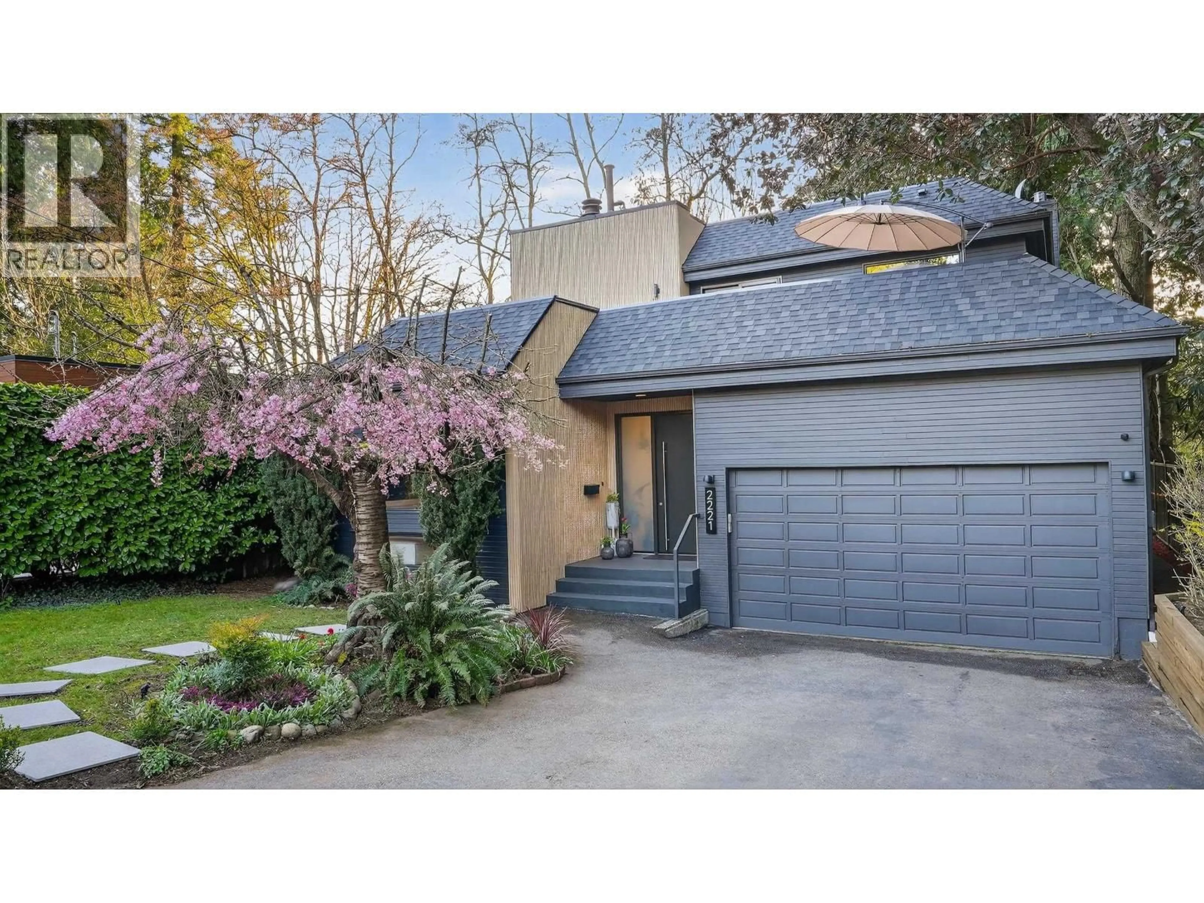 Home with brick exterior material, street for 2221 BOWSER AVENUE, North Vancouver British Columbia V7P2Z1