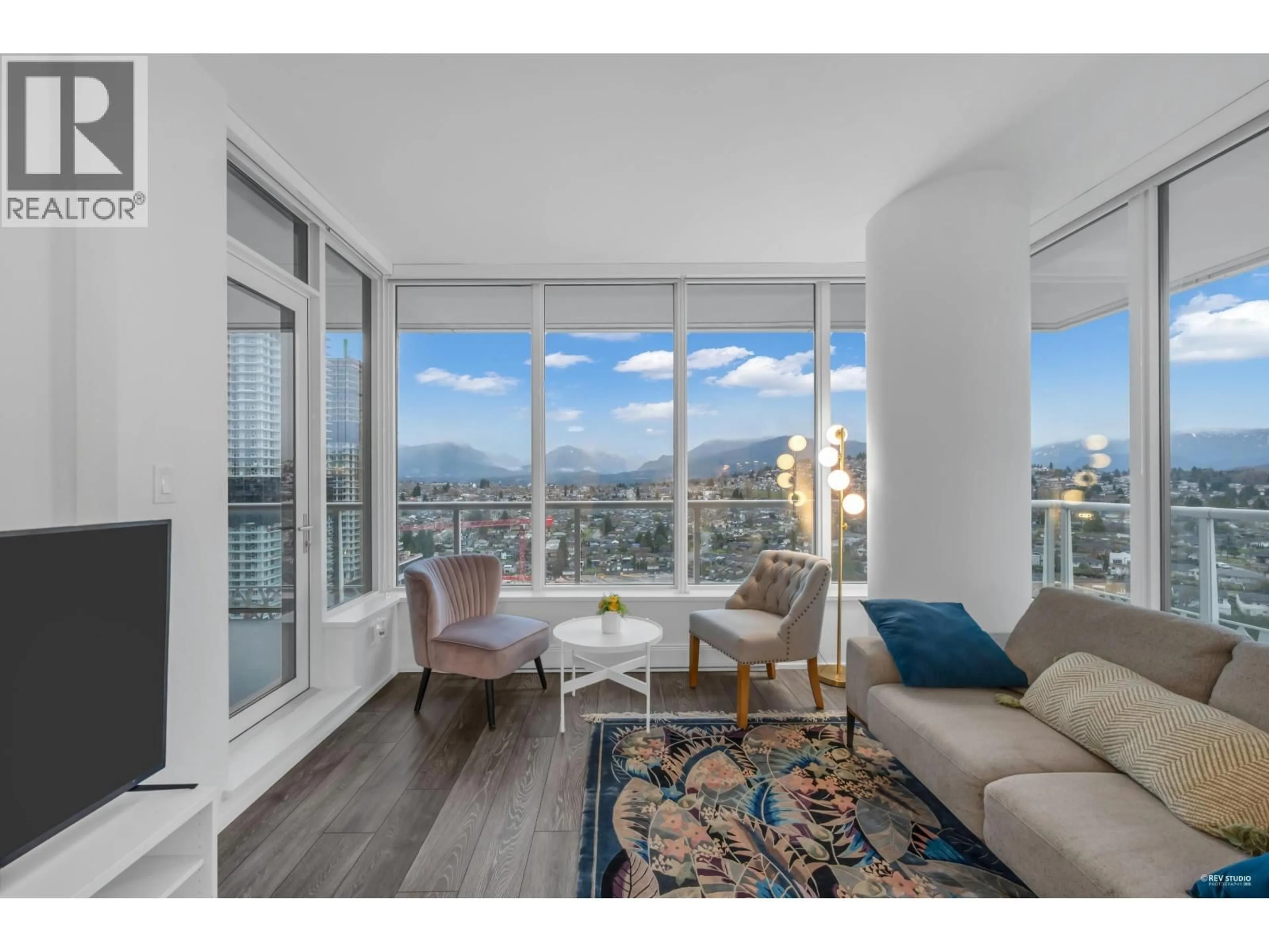 Living room with furniture, wood/laminate floor for 2212 - 1955 ALPHA WAY, Burnaby British Columbia V5C0K6