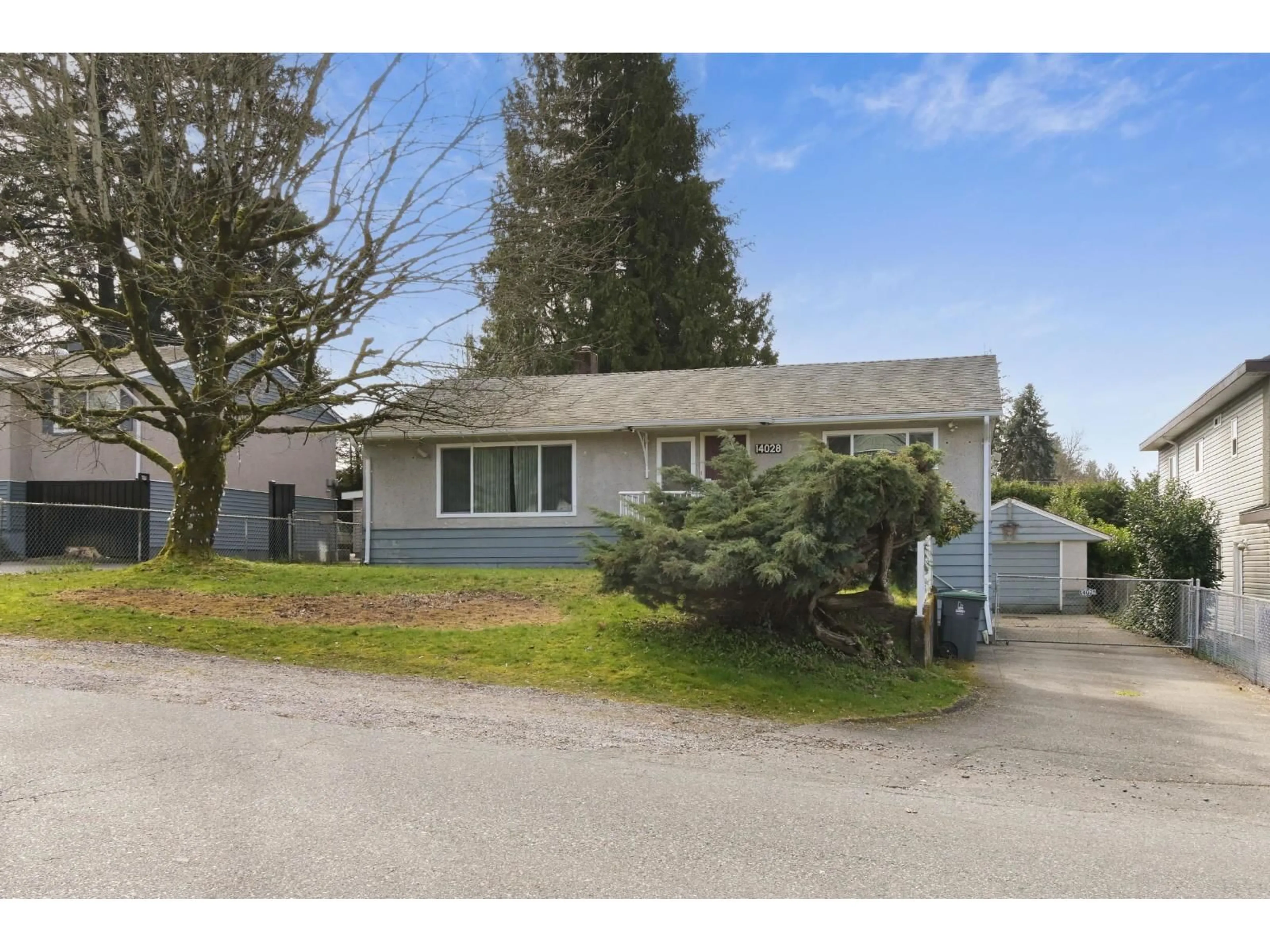 Home with vinyl exterior material, street for 14028 102 AVENUE, Surrey British Columbia V3T1P4